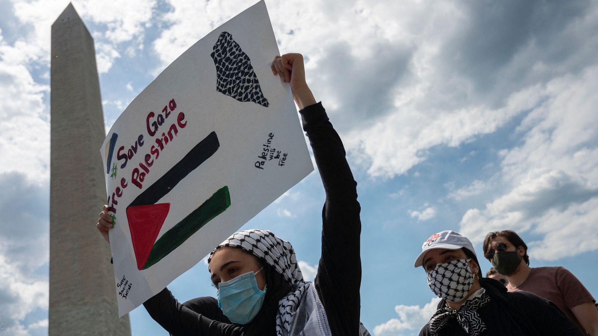  Activists and protesters march in support of Palestine near the Washington monument in Washington, DC