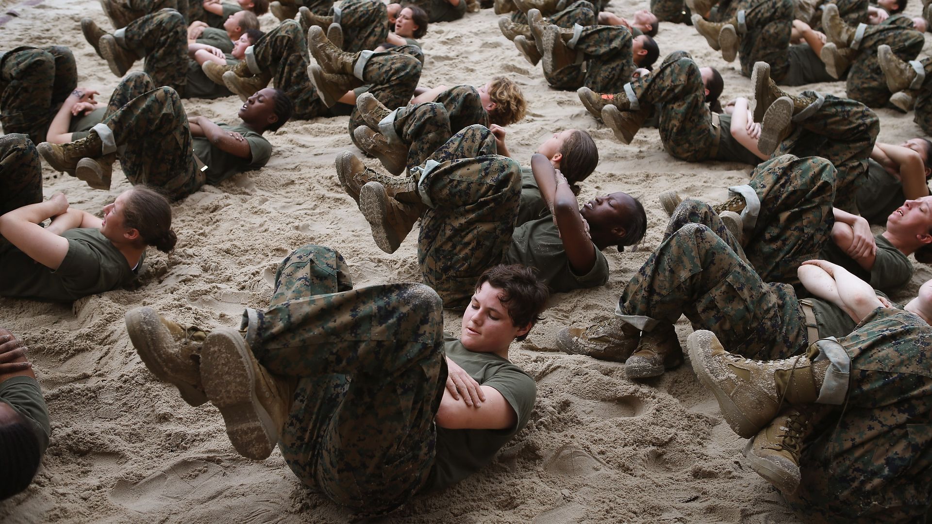 Boot camp training in a sand pit