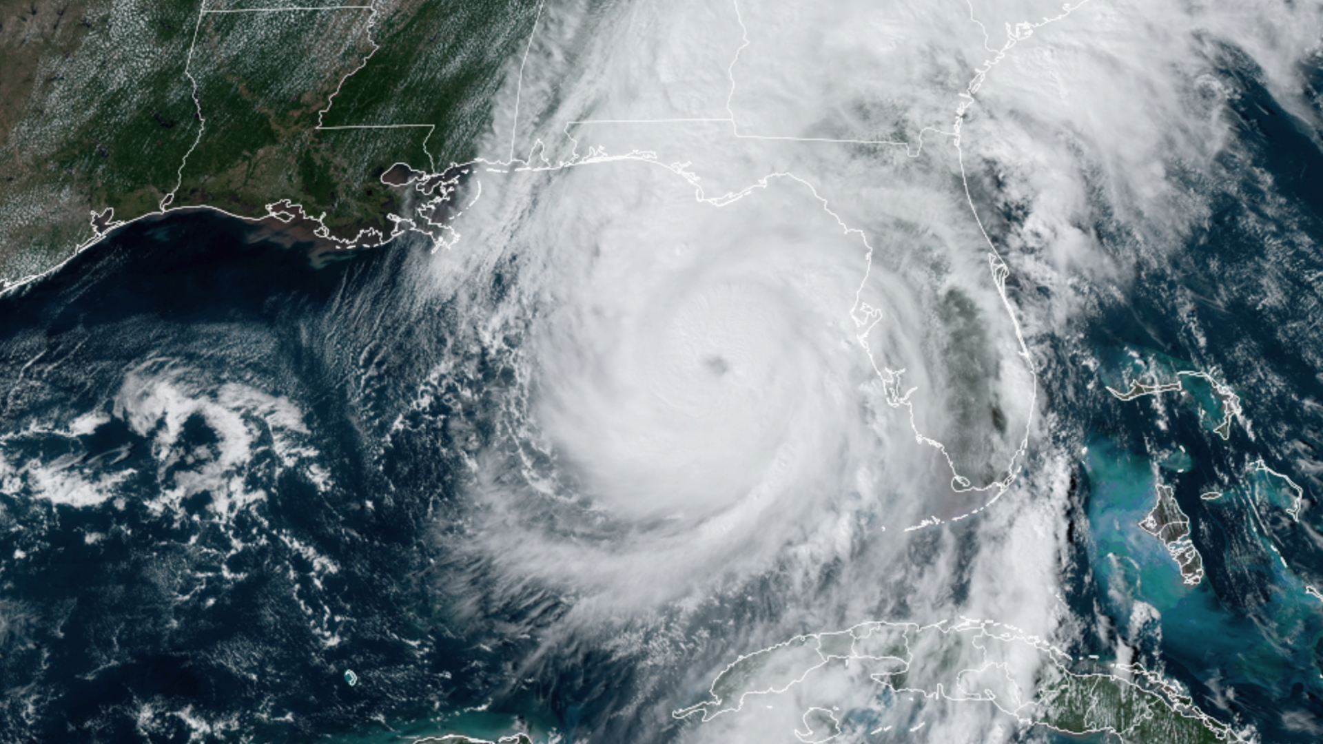 A satellite image showing the massive white eye of Hurricane Helene.