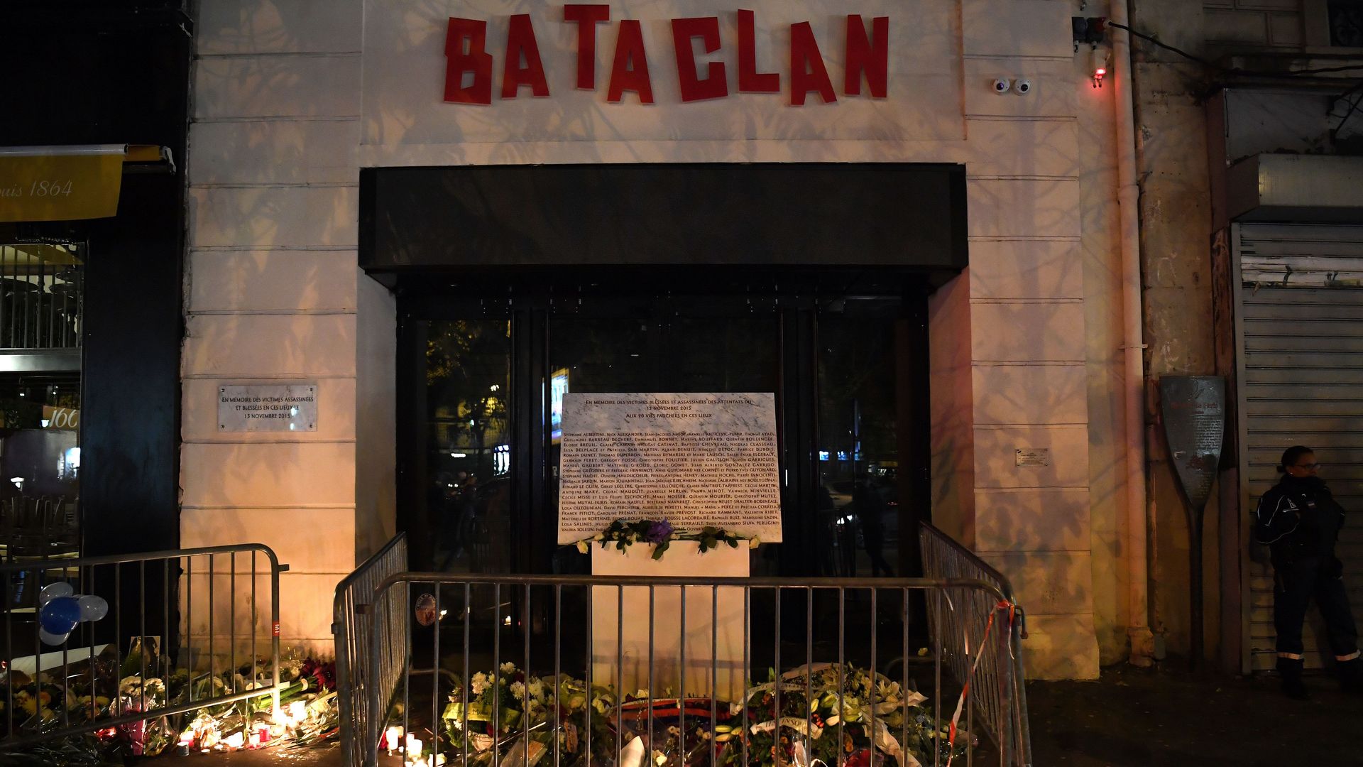 A makeshift memorial outside the commemorative plaque outside the Bataclan concert hall in tribute of the victims of the attack on the Bataclan