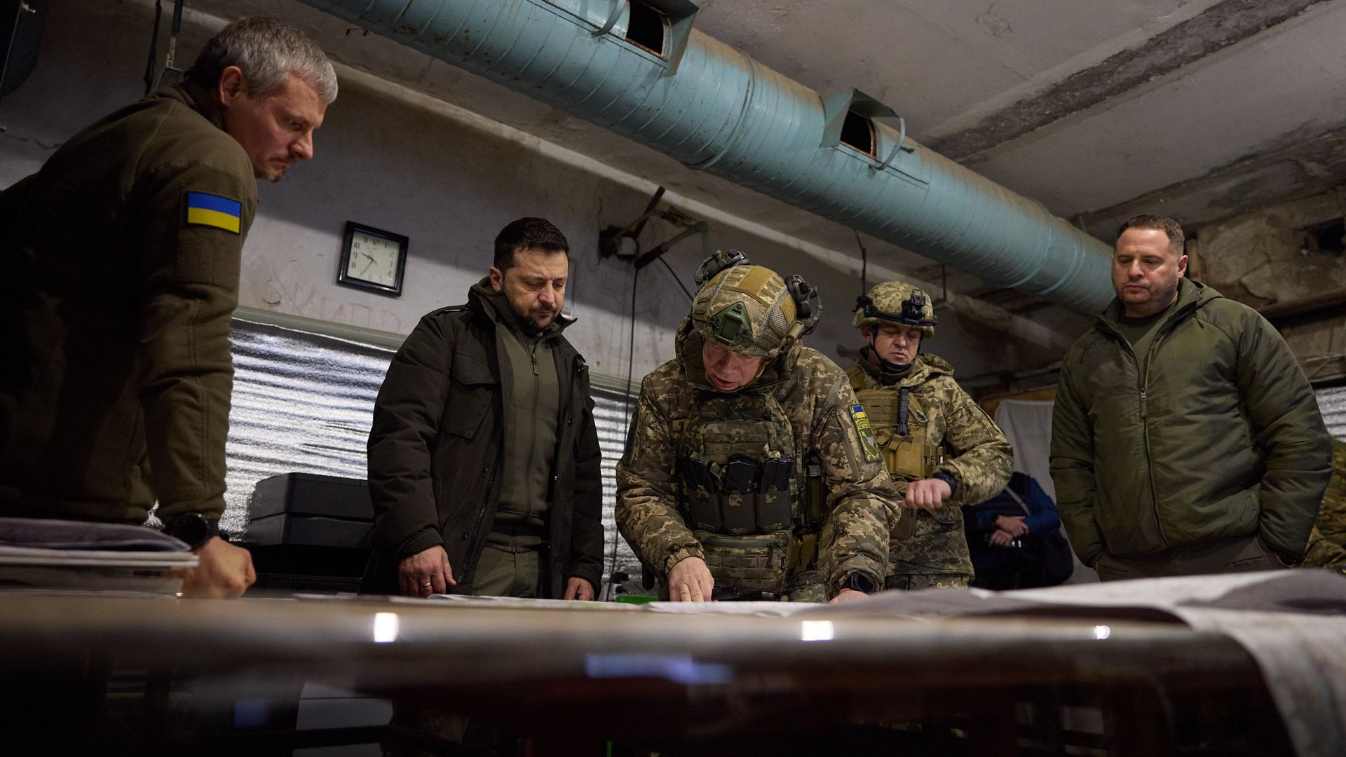 Ukrainian President Volodymyr Zelensky with soldiers and other Ukrianian political officials in Kharkiv, Ukraine, on Nov. 30.