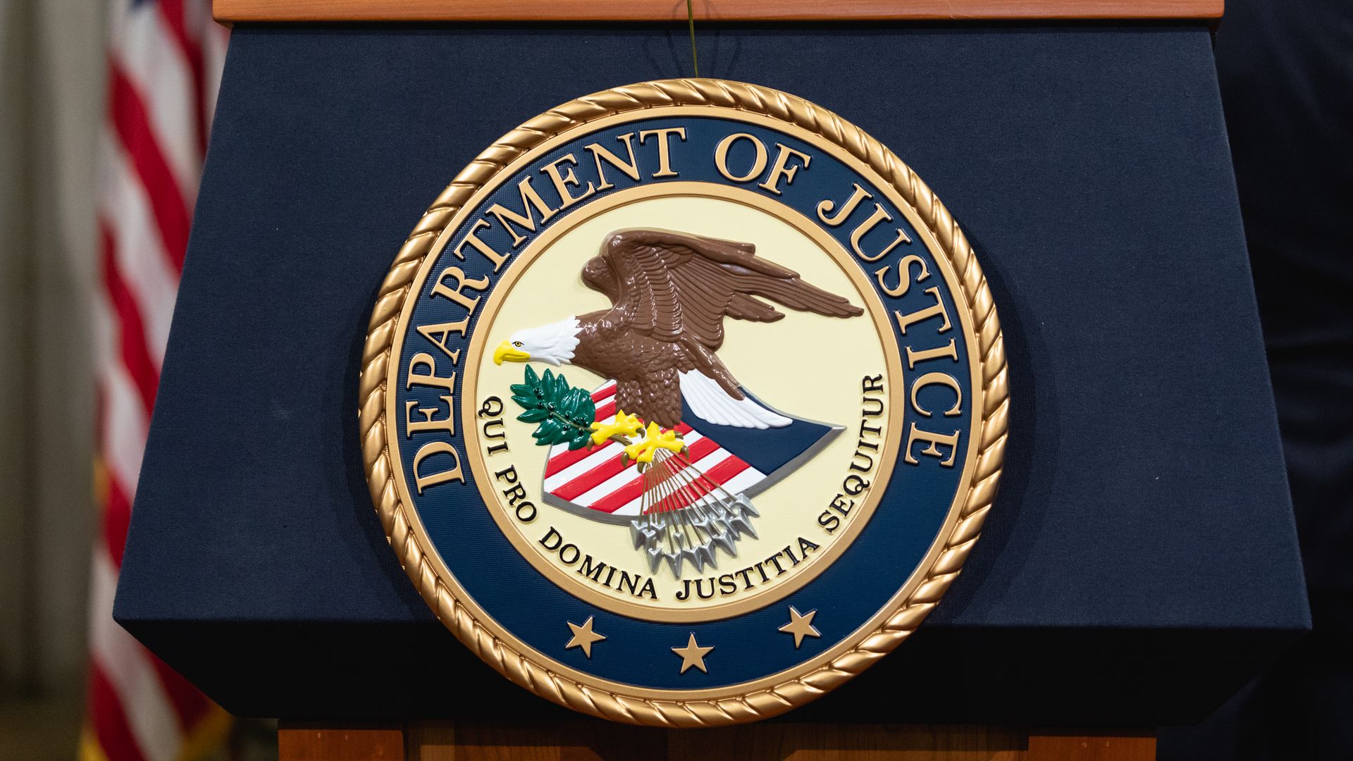 The Department of Justice seal on a podium in Washington, D.C., in 2018.