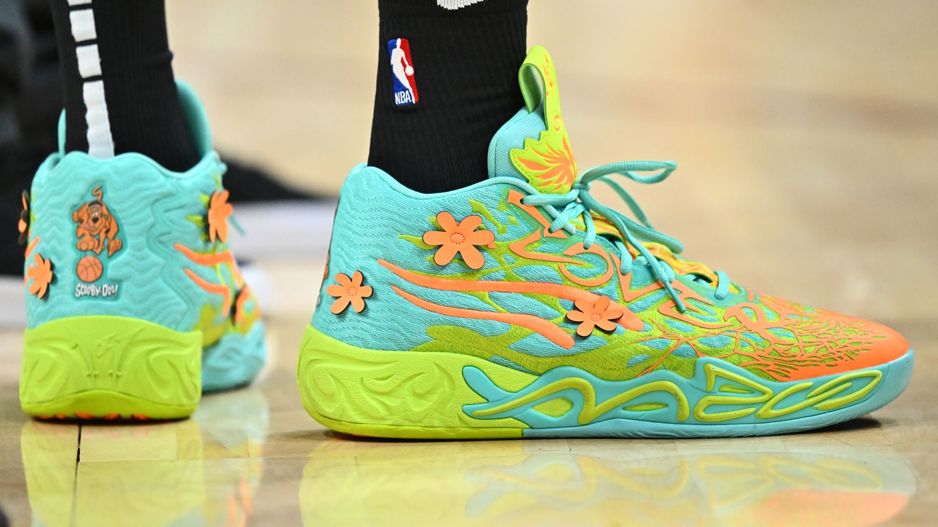 NBA sneakers with Scooby Doo on them.