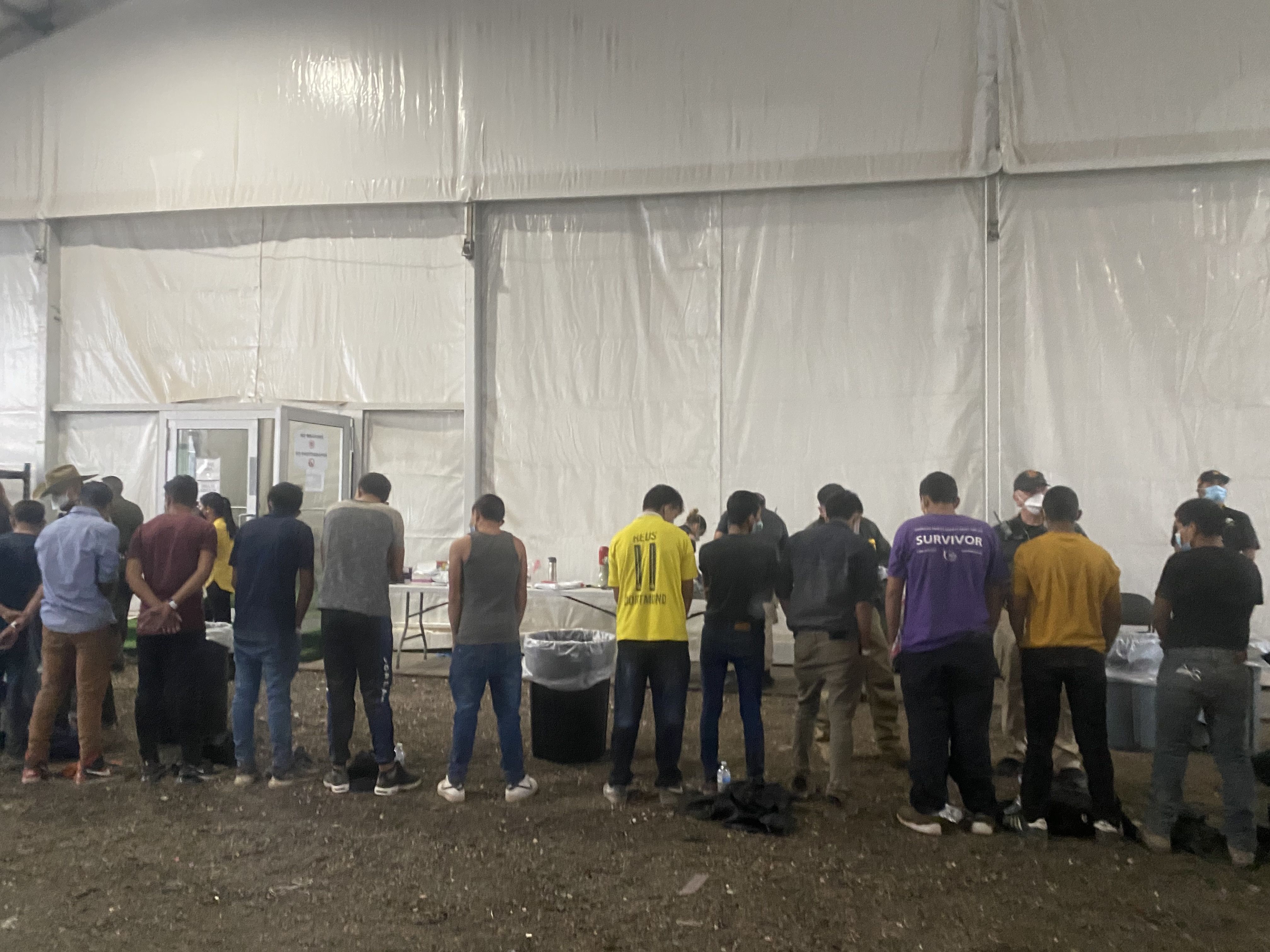 Migrant teenage boys receive their initial health screening before entering an already overcrowded Border Patrol center in Donna, Texas. 