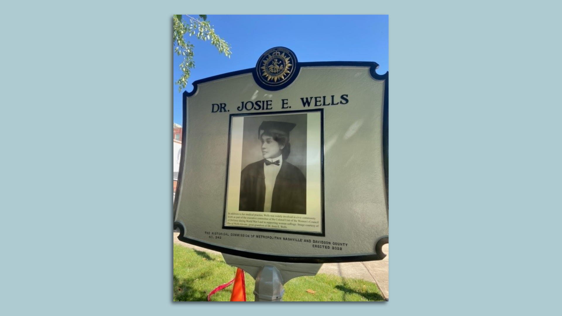 A historical marker for Dr. Josie E. Wells.