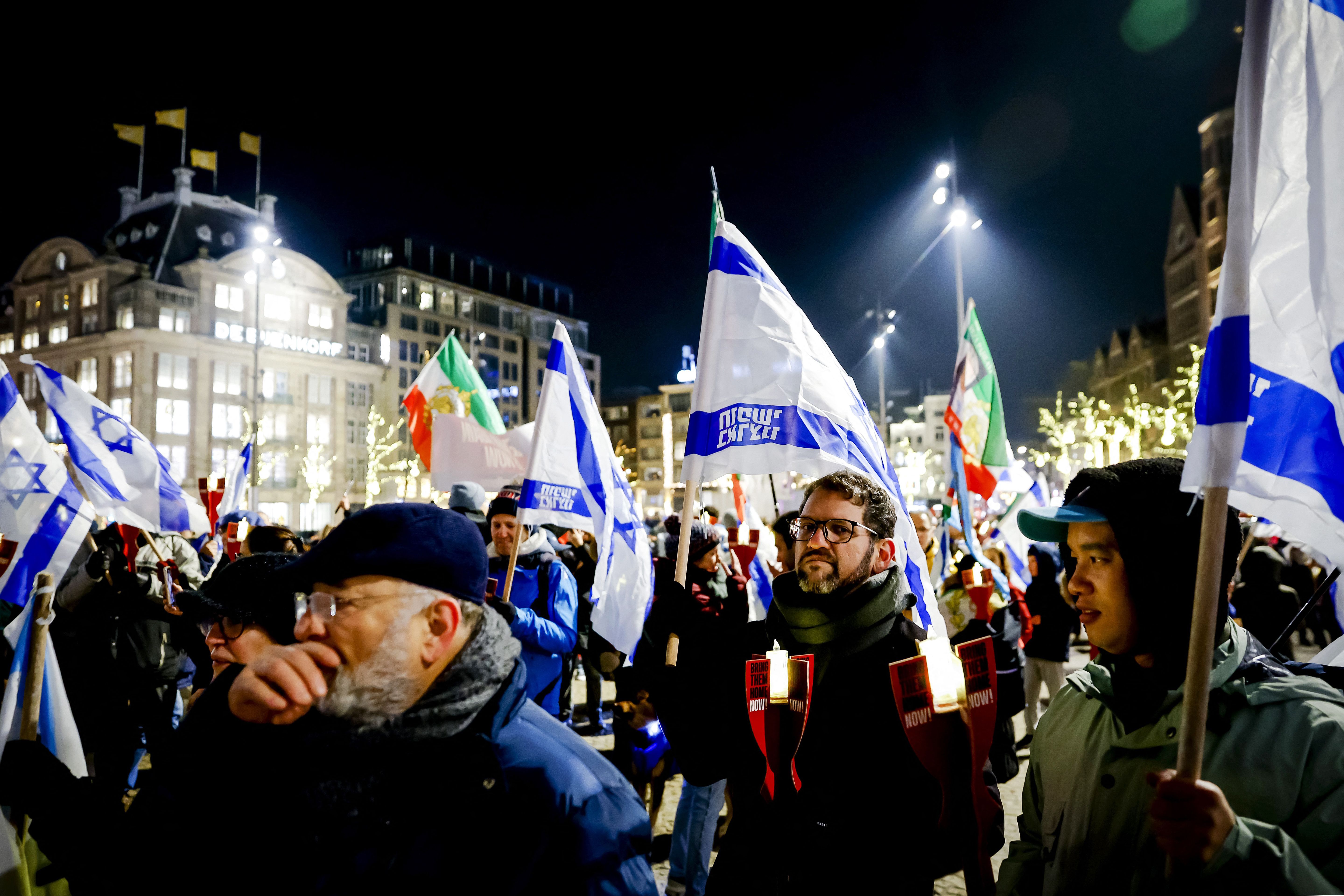 People march at Dam Square during the national Hanukkah celebration in Amsterdam.