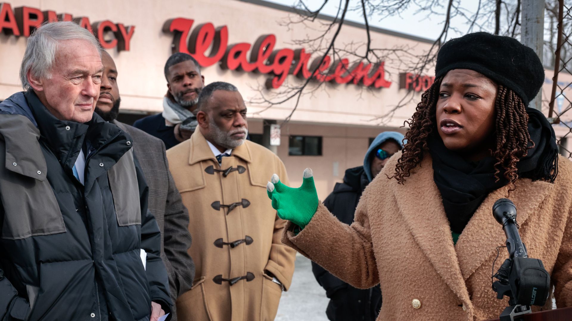 Boston, MA - January 19: Senator Edward Markey, left, listens as Boston City Council President Ruthzee Louijeune, right, addresses the media at Walgreens. Senator Edward Markey joined public officials and community leaders to speak out against Walgreens' plan to close a store in Boston.