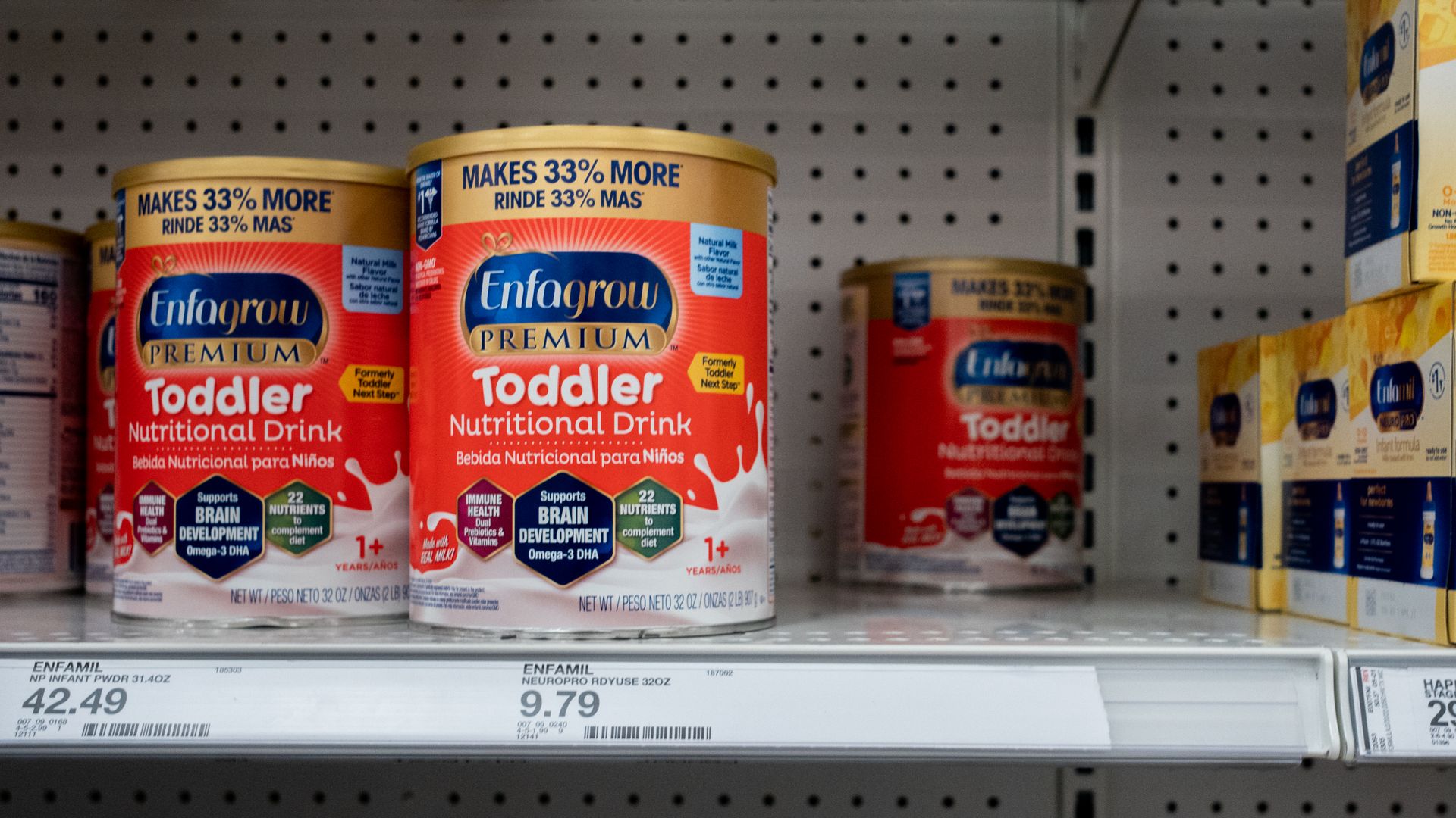 Baby formula on shelves.