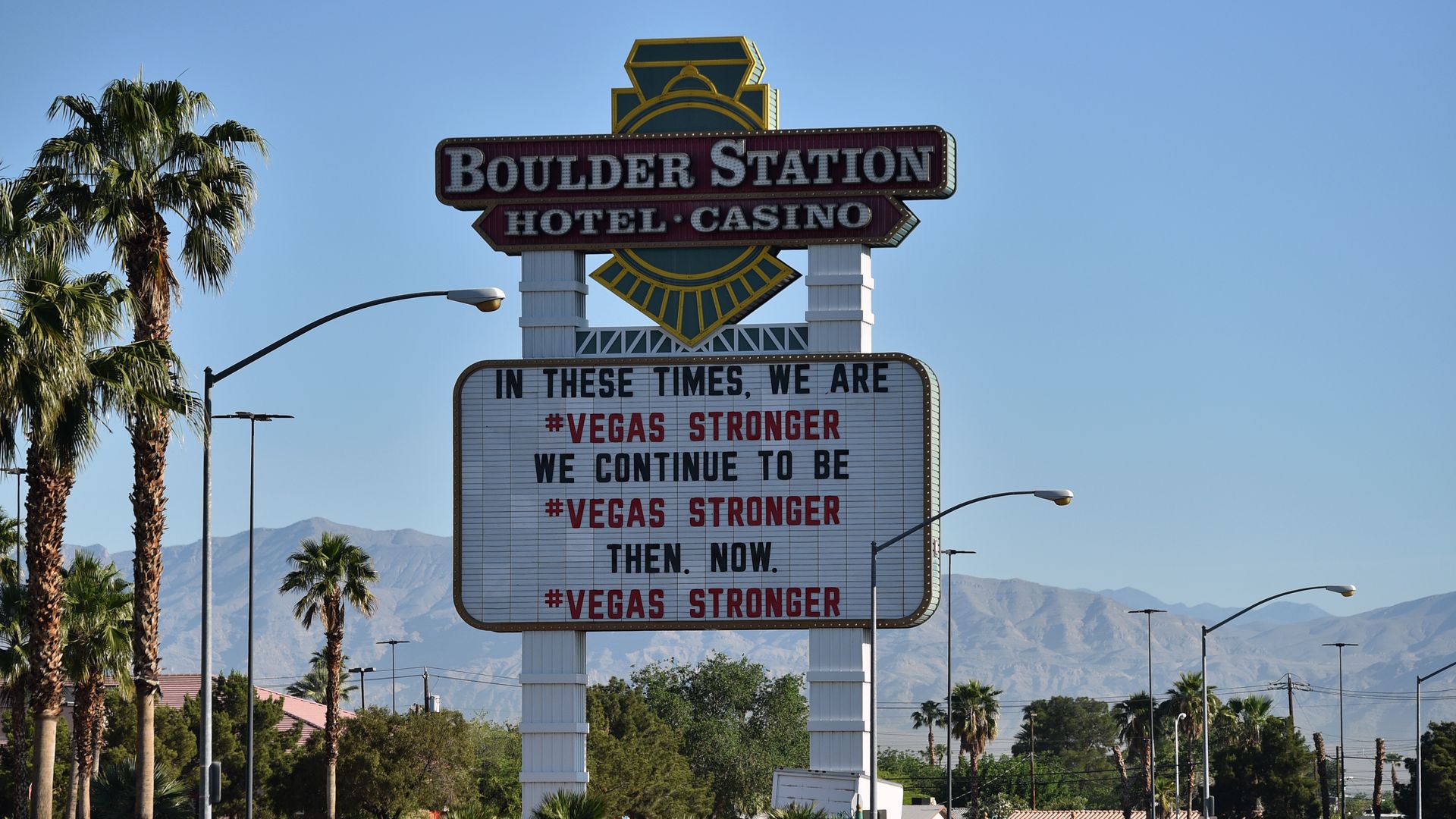 Vehicles are lined up around Boulder Station Hotel & Casino to pick up food