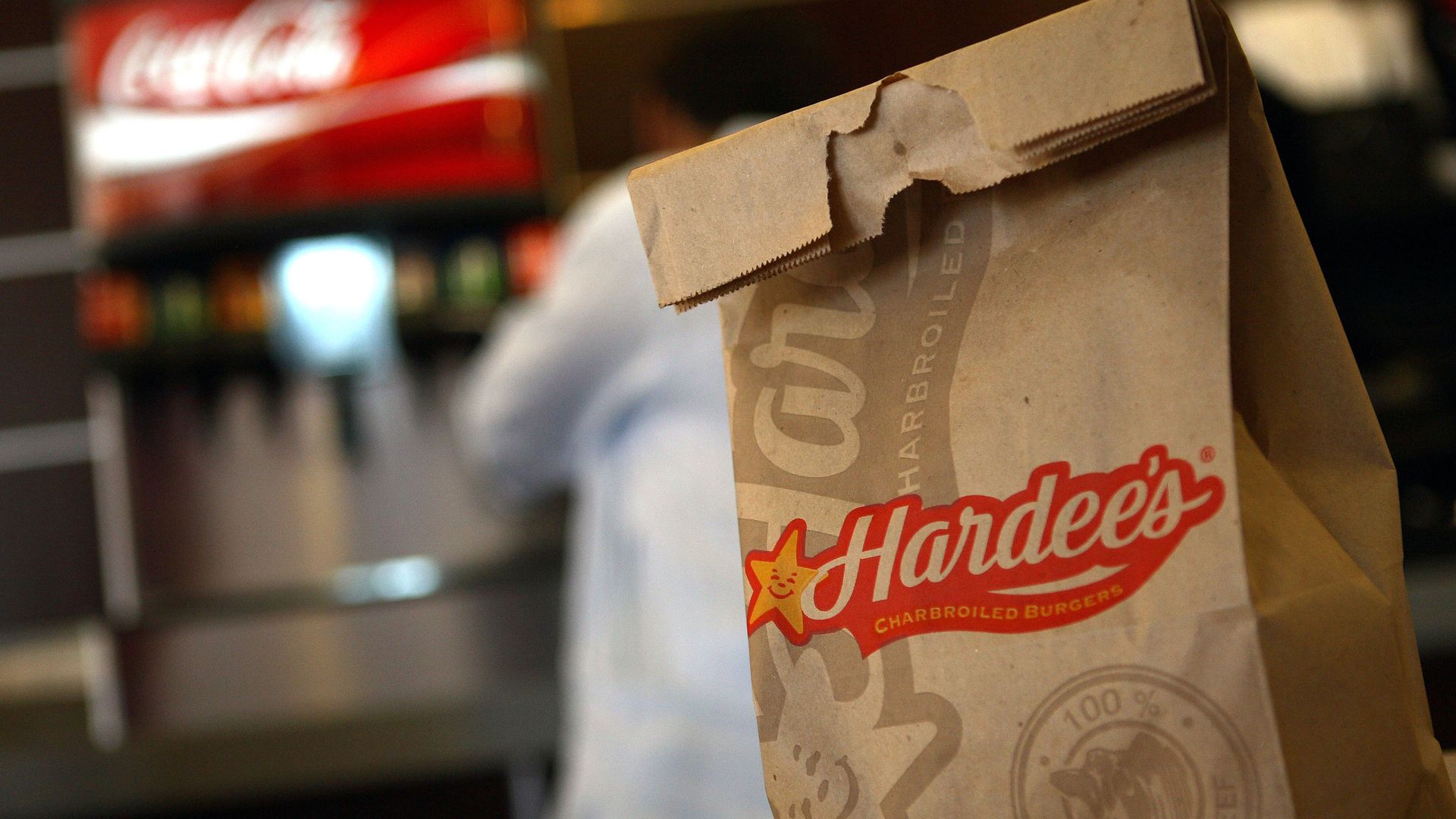 Logo of Hardee's on a takeout bag.