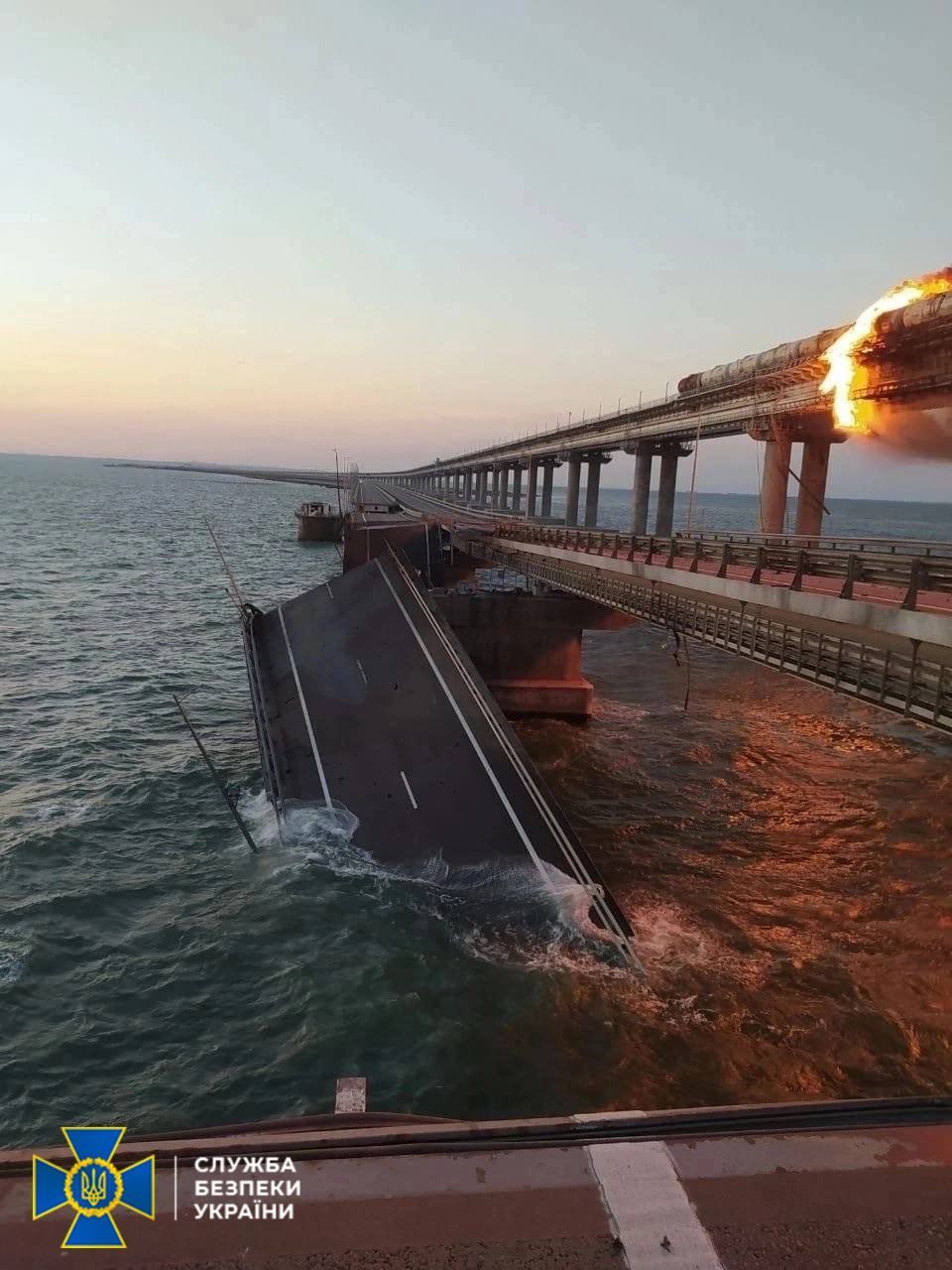 Explosion causes fire at the Kerch bridge.