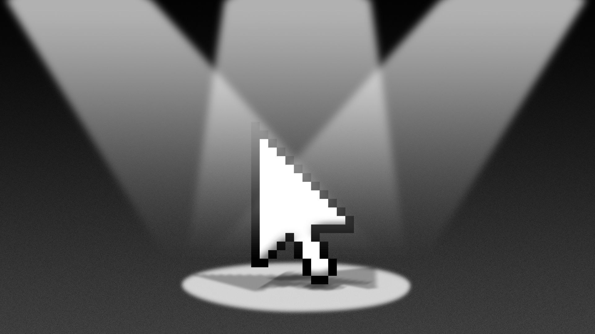 A computer arrow in stage spotlights