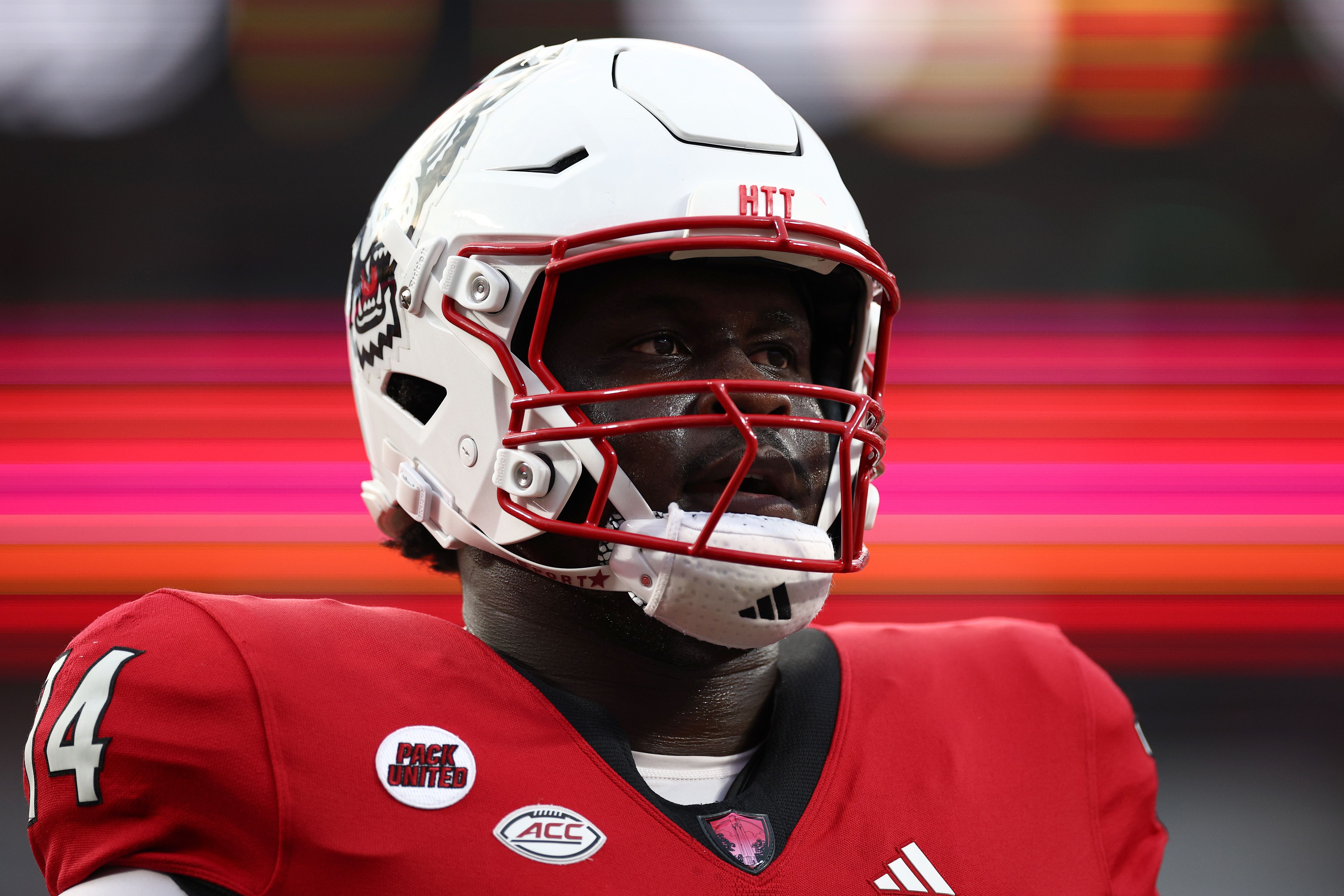 Anthony Belton #74 of the NC State Wolfpack looks on prior to the Duke's Mayo Classic against the Tennessee Volunteers at Bank of America Stadium on September 07, 2024 in Charlotte, North Carolina. (Photo by Jared C. Tilton/Getty Images)