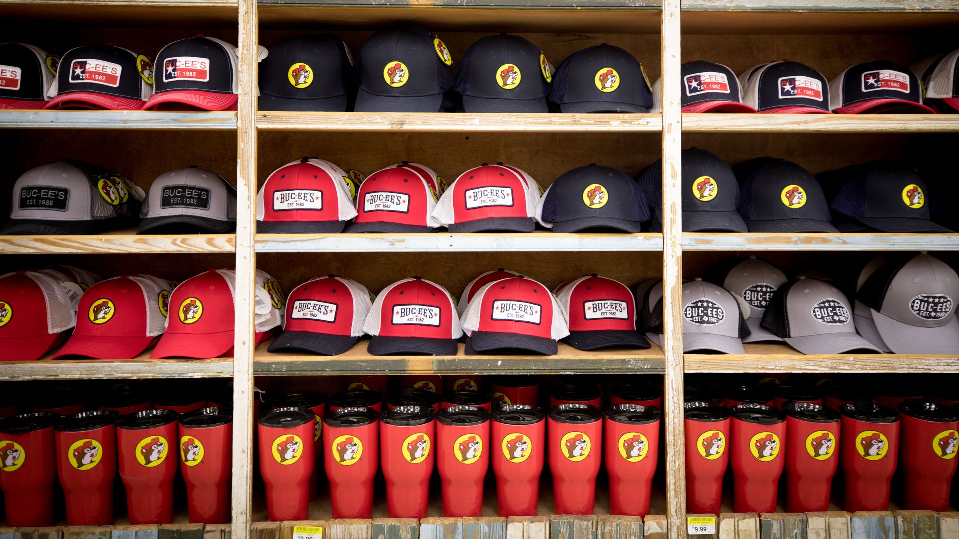 Rows of Buc-ee's hats and other merchandise. 