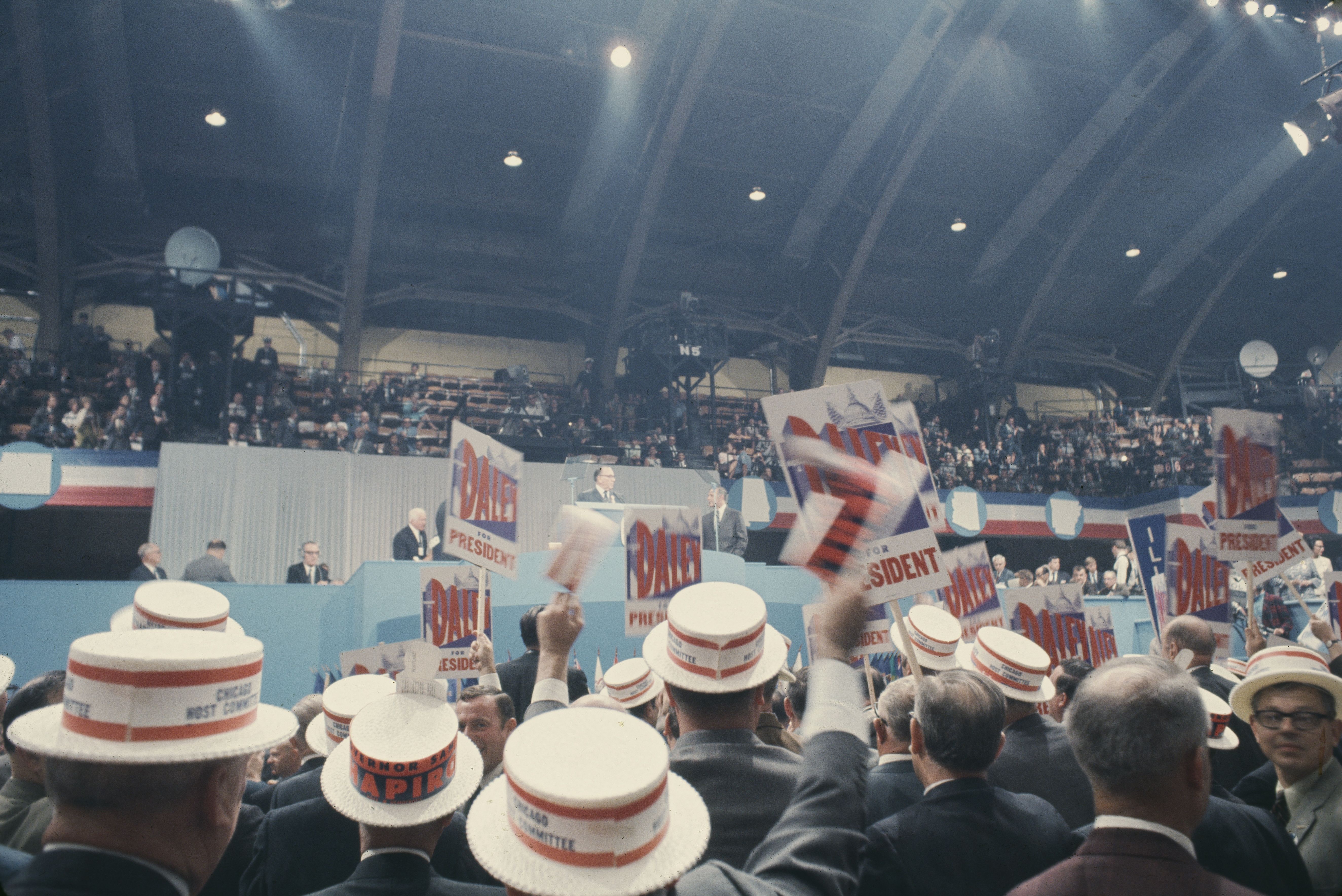 Photo of delegates inside a convention hall