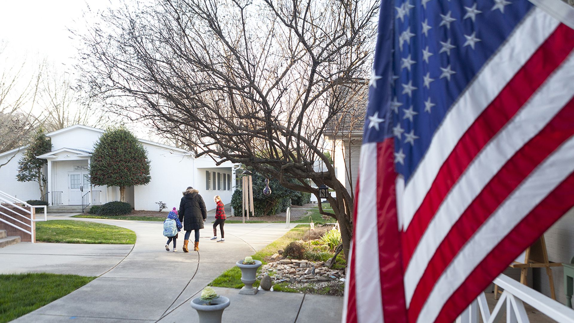 Dana Mackay drops her youngest child off at Avondale Presbyterian Church Children's Center for daycare on 01/20/2020 in Charlotte, NC. Photos by Andy McMillan for Axios Charlotte.