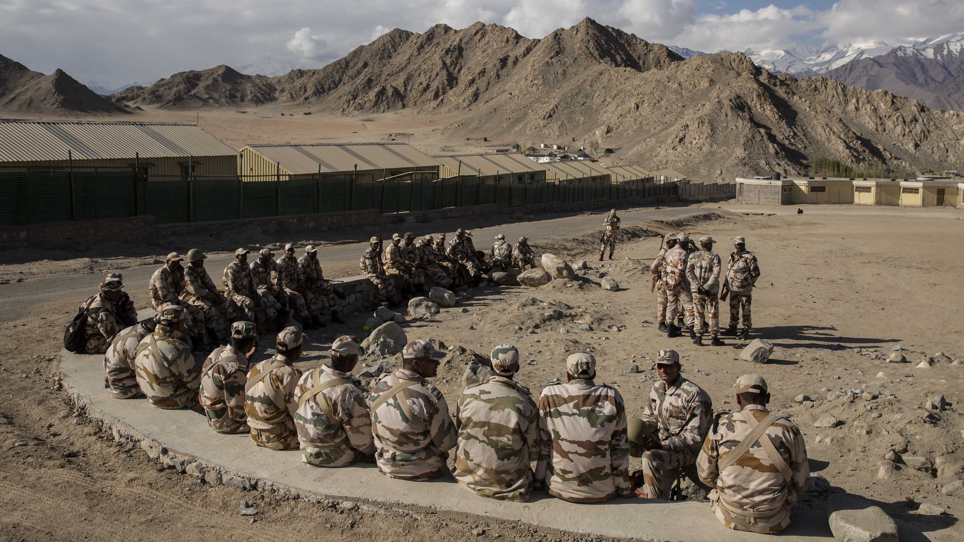  Indian security force soldiers on election duty wait to leave a central collection point to head to secure polling stations, on May 6, 2014 in Leh, Ladakh, India.