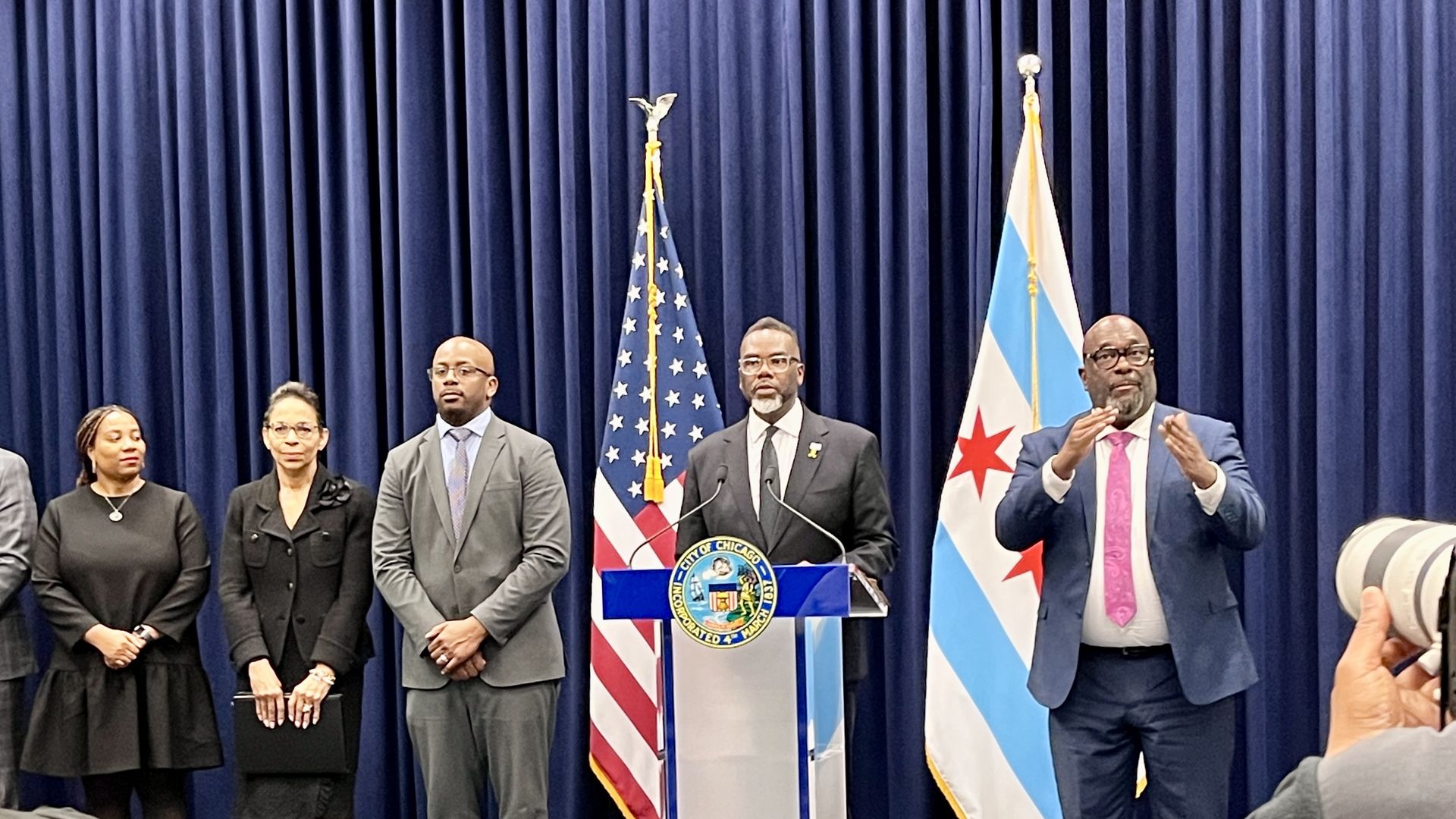 People standing at a podium