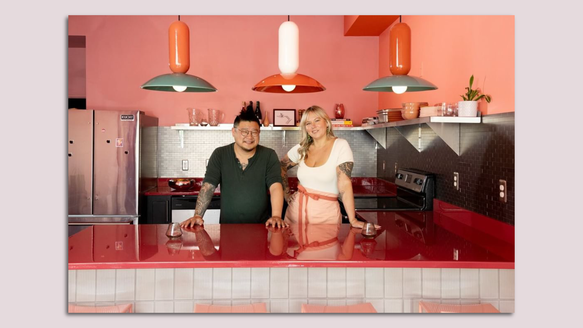 Brittanny anderson and Steve Yang in an all-pink kitchen and bar