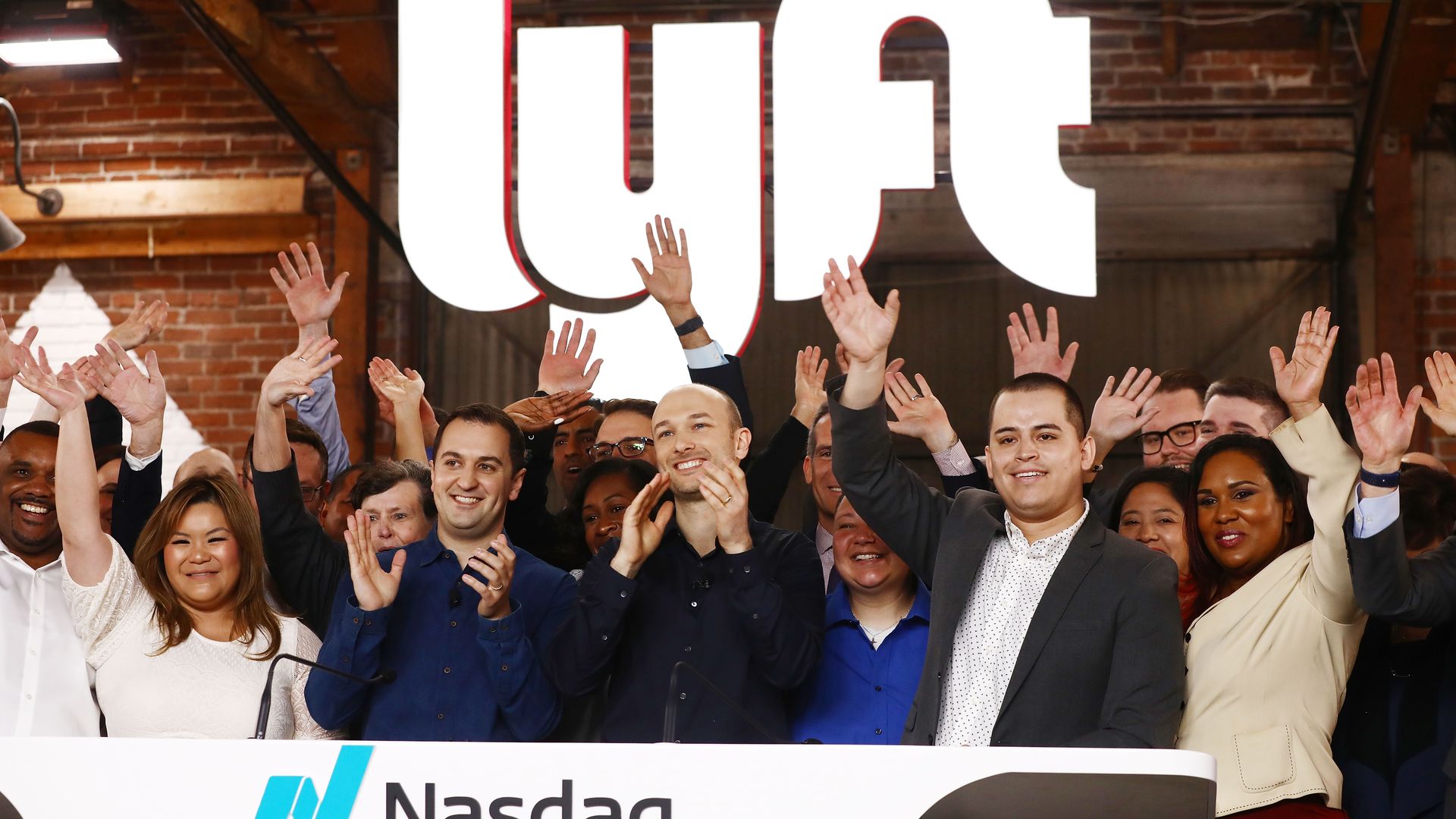 Lyft employees ring nasdaq bell