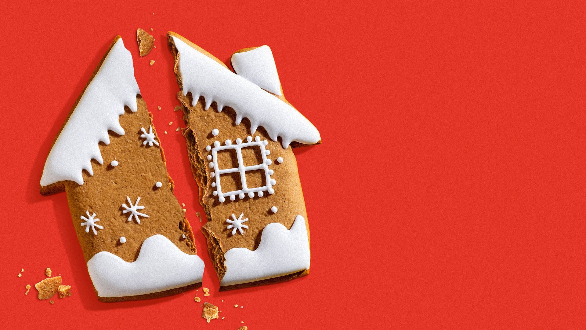 Illustration of a gingerbread house cookie broken in half.
