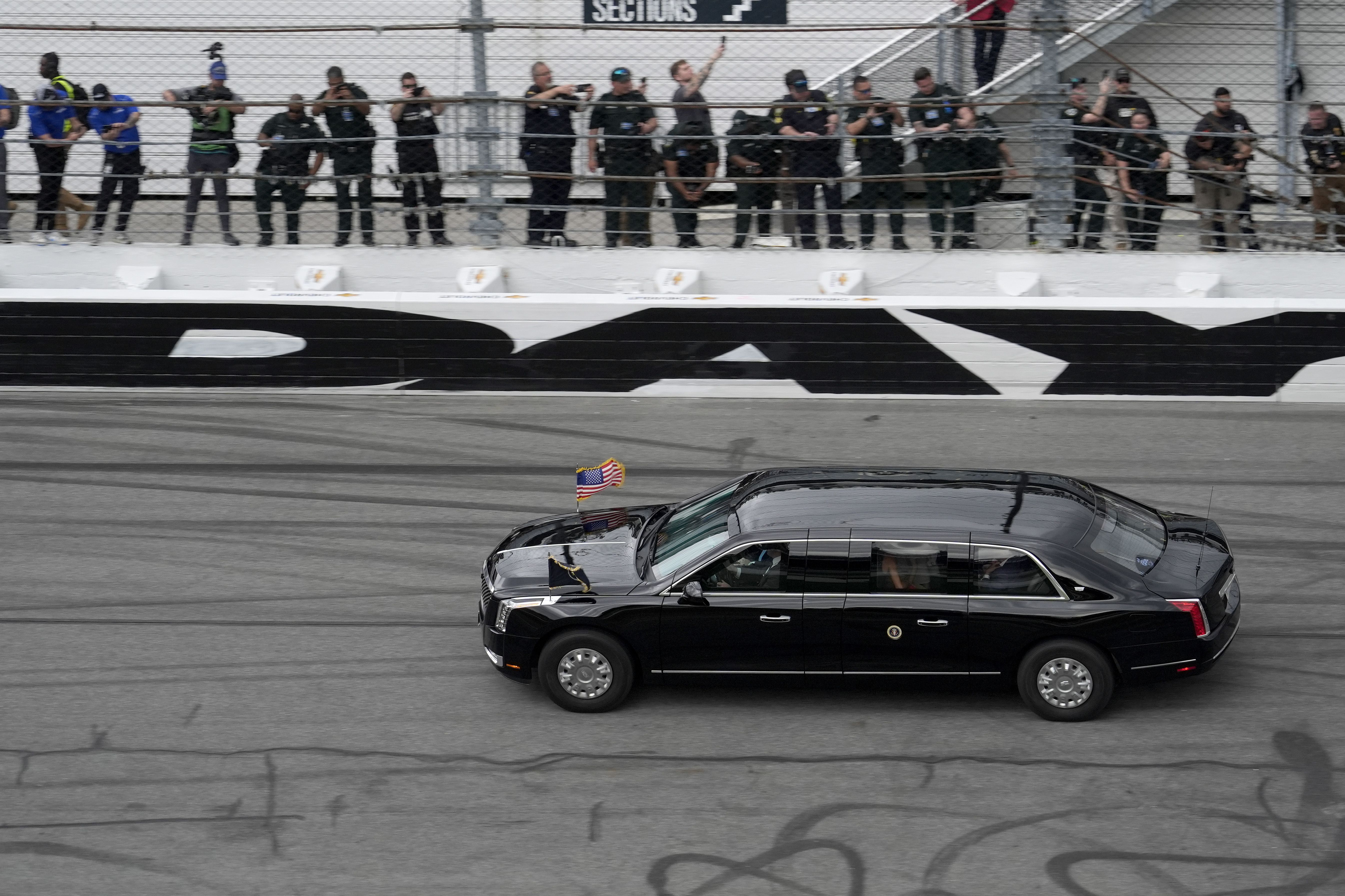 Secret Service drives President Trump around Daytona International Speedway in "The Beast" before the Daytona 500 yesterday.