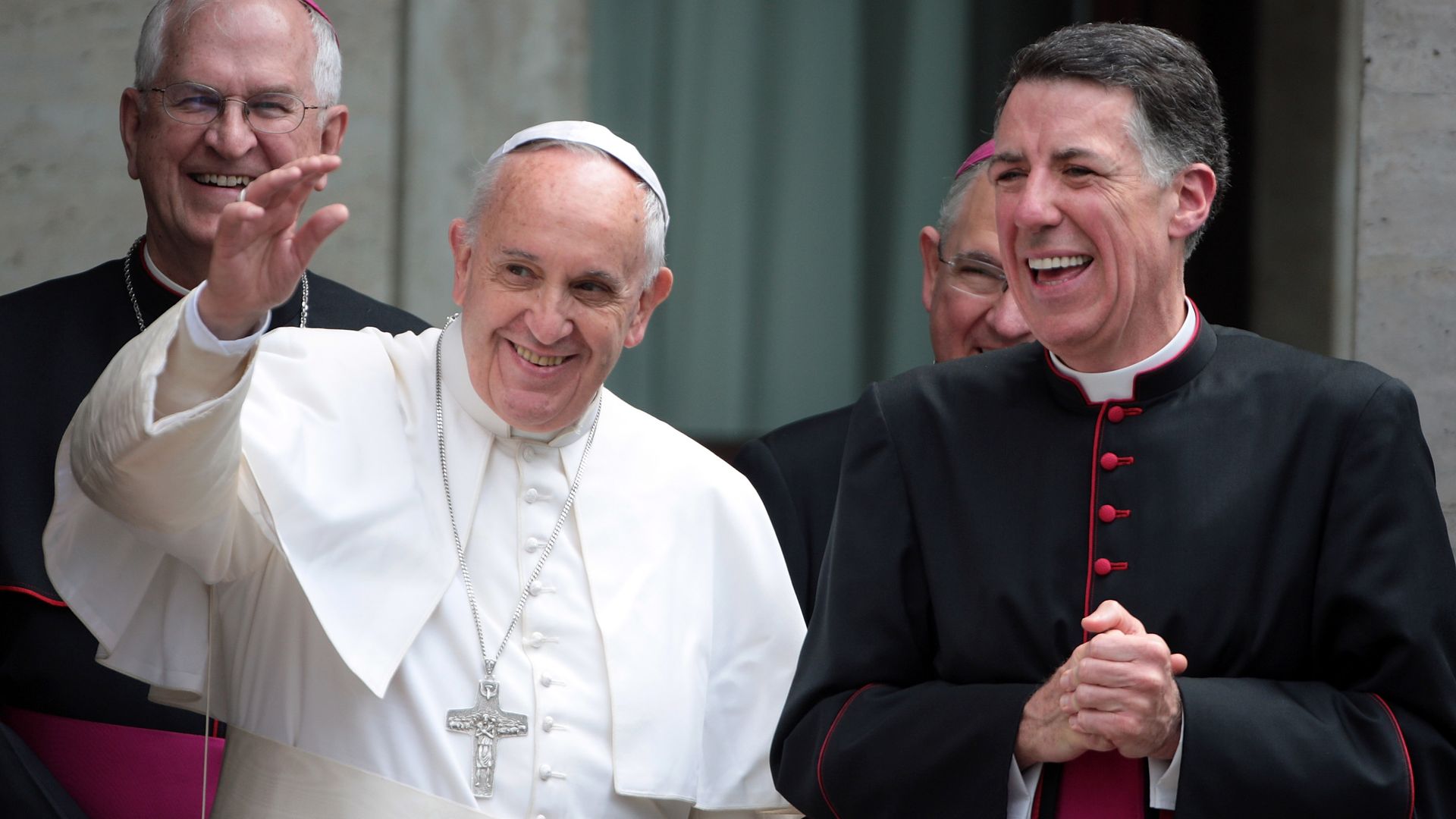 Pope Francis (C), flanked by Rector of the Pontifical North American College James F. Checchio (R) and President of the United States Conference of Catholic Bishops Joseph Edward Kurtz (L), leaves the Pontifical North American College.