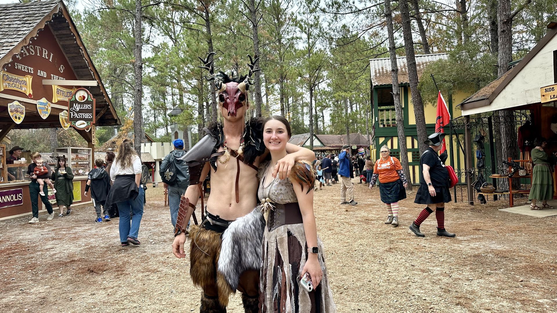 Photo shows two people dressed up at the Louisiana Renaissance Festival.