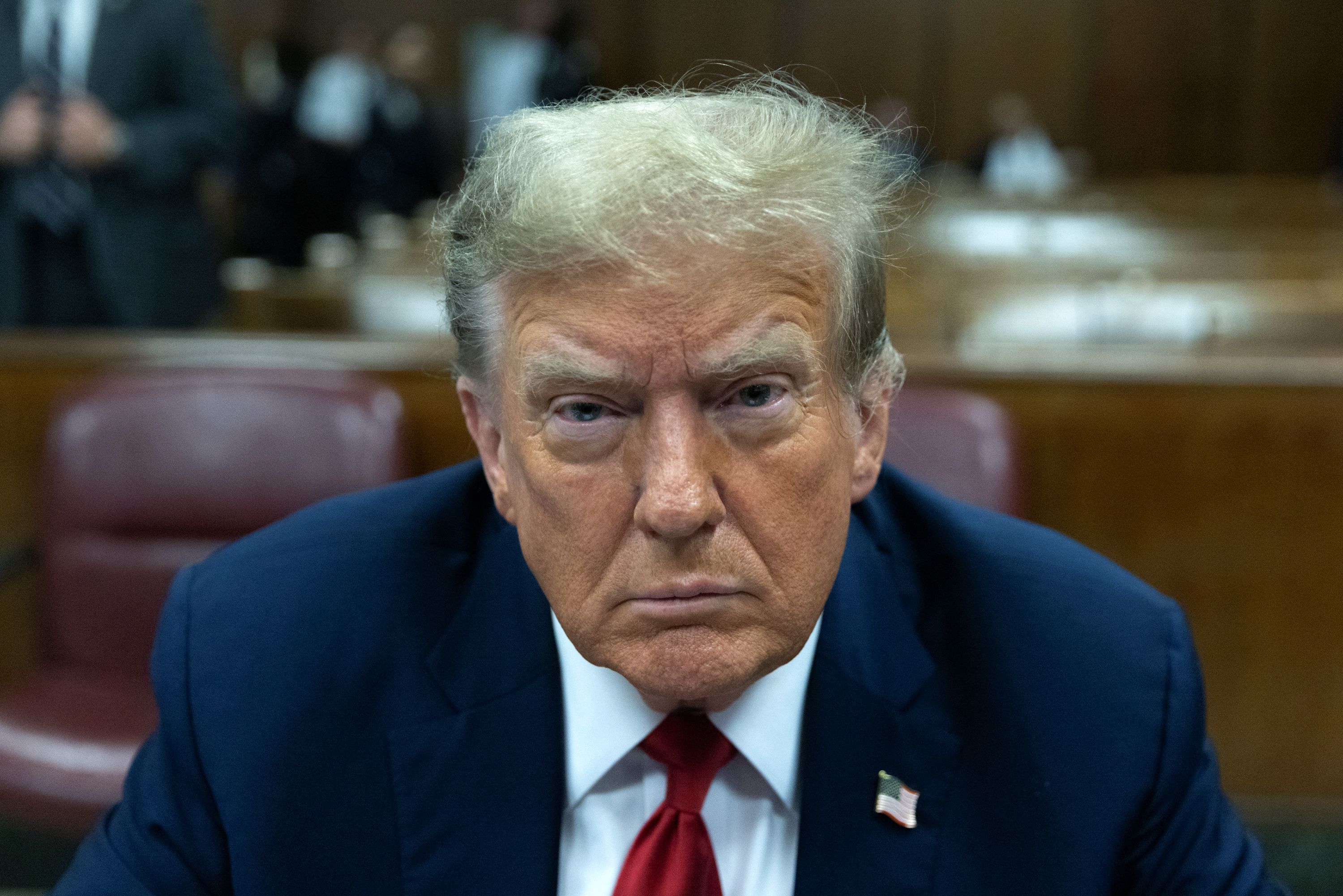 Former President Trump appears in Manhattan Criminal Court for jury selection yesterday.