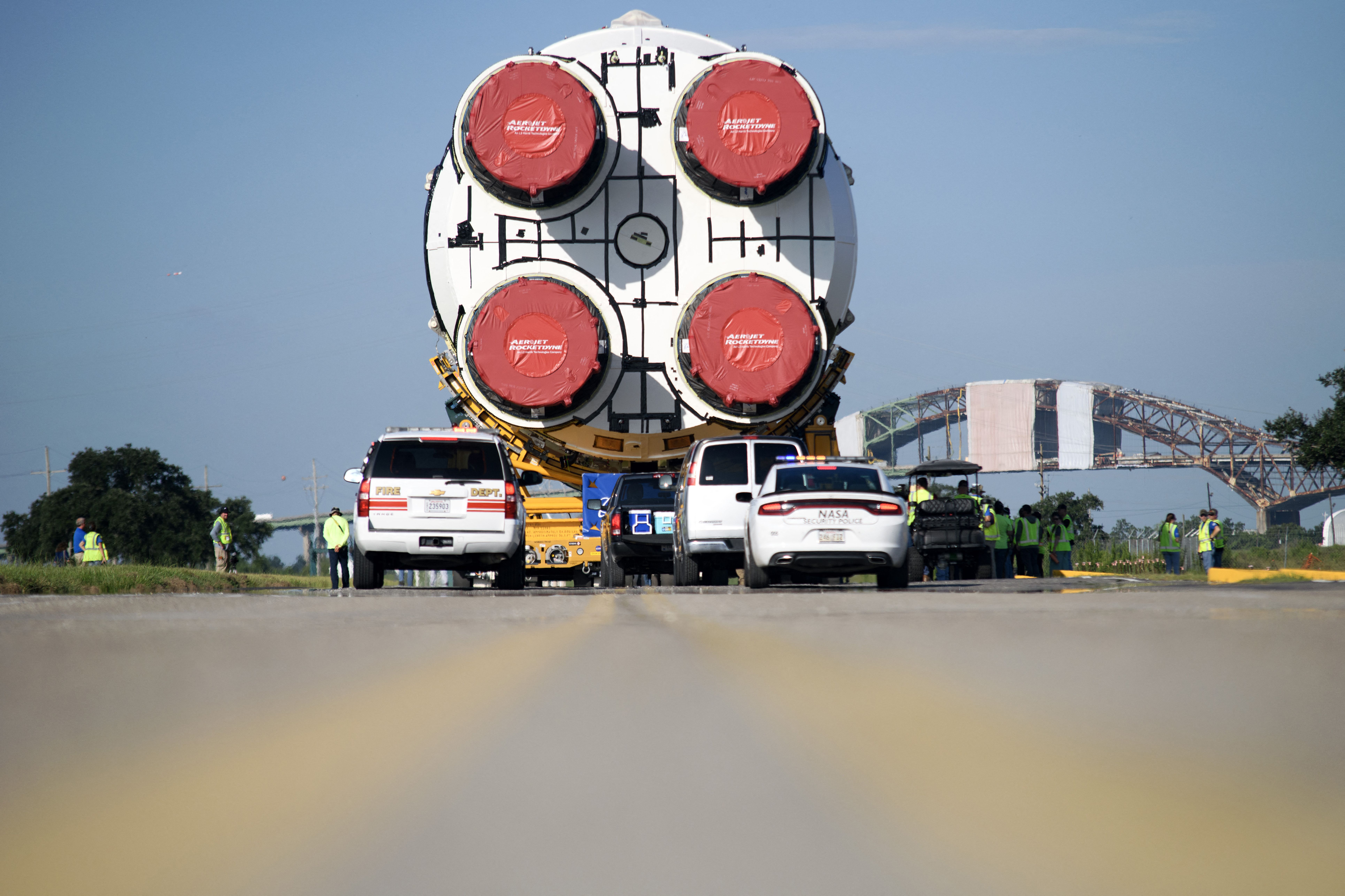 TOPSHOT - The Artemis II rocket core stage is wheeled out at the NASA Michoud Assembly Facility in New Orleans, Louisiana, on July 16, 2024. The stage will launch the first crewed Artemis mission. (Photo by Mark Felix / AFP) (Photo by MARK FELIX/AFP /AFP via Getty Images)