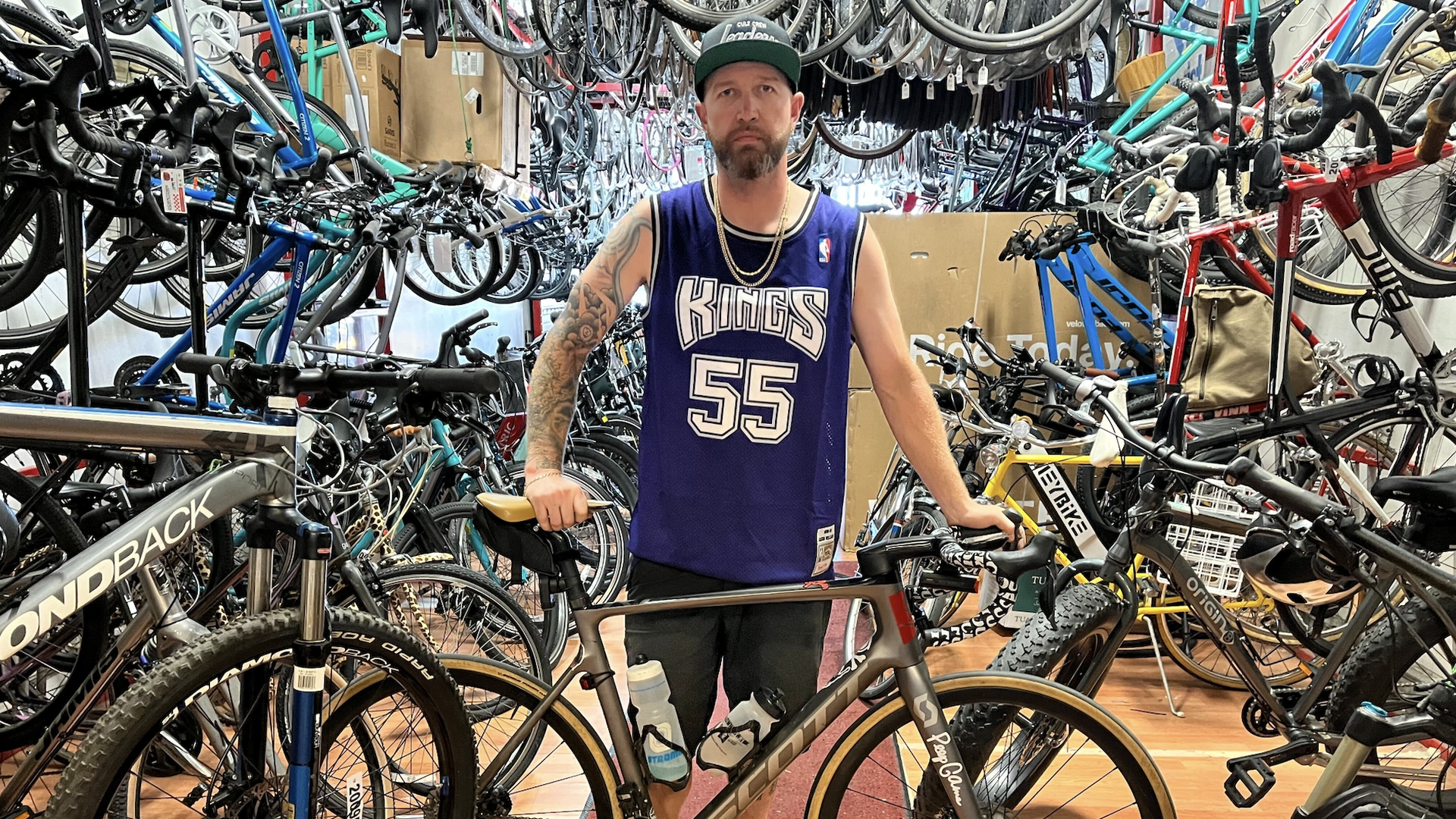 A man with a bike in bike shop