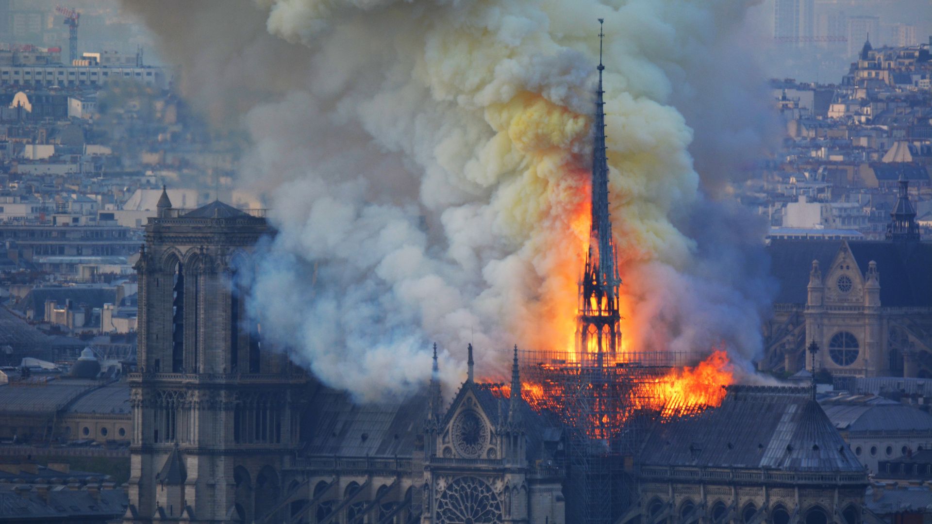 Smoke and flames rise during a fire at the landmark Notre-Dame Cathedral in central Paris on Monday. 