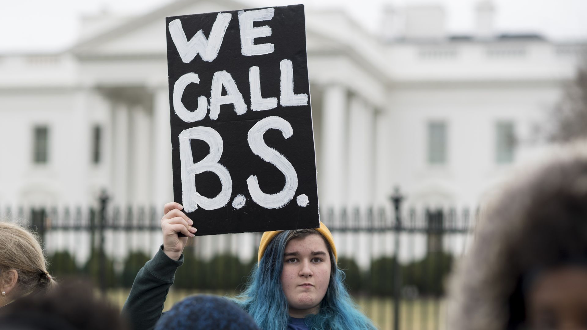 Washington, D.C., area students and supporters protest against gun violence outside of the White House.