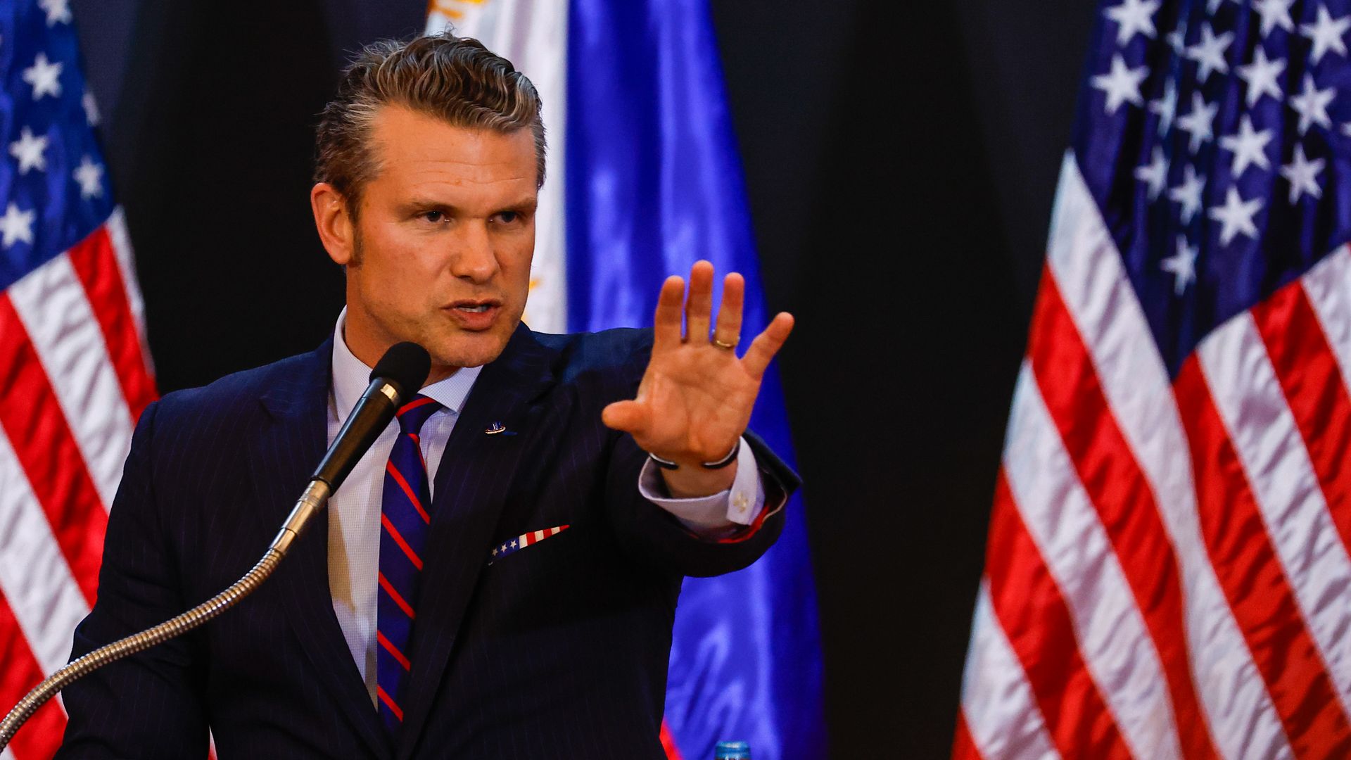 Defense Secretary Pete Hegseth delivers a speech during a press conference, after meeting with Philippines Secretary of National Defense Gilbert Teodoro, at a military camp in Quezon City, Philippines, on March 28. 