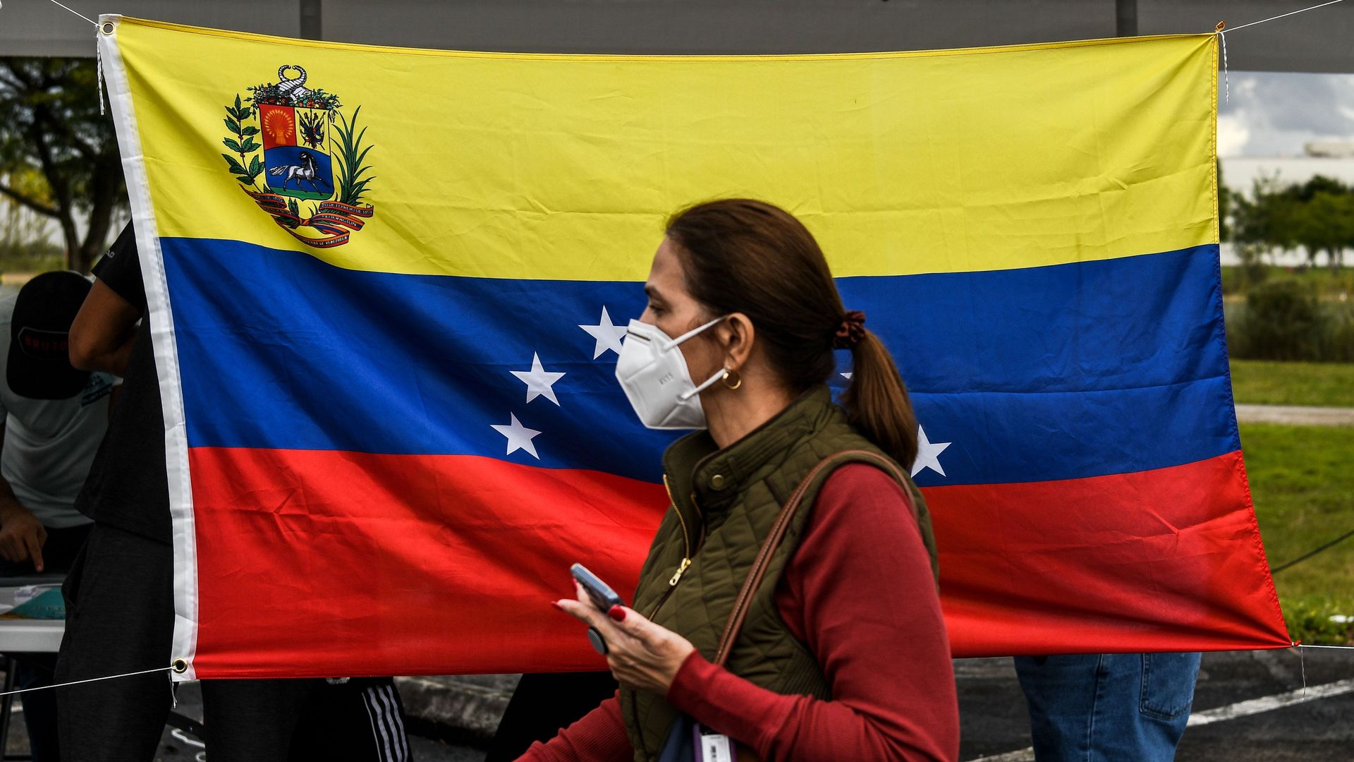 Venezuelan citizens participate in the vote for the popular consultation, 