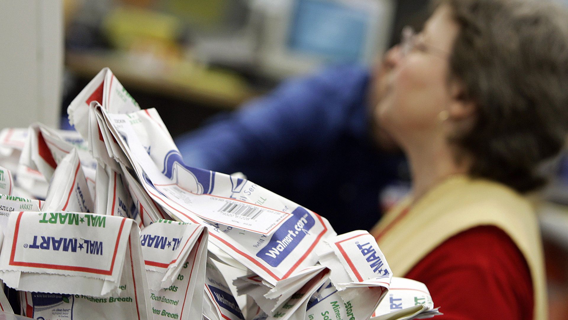 Filled prescription bags at a Walmart store.