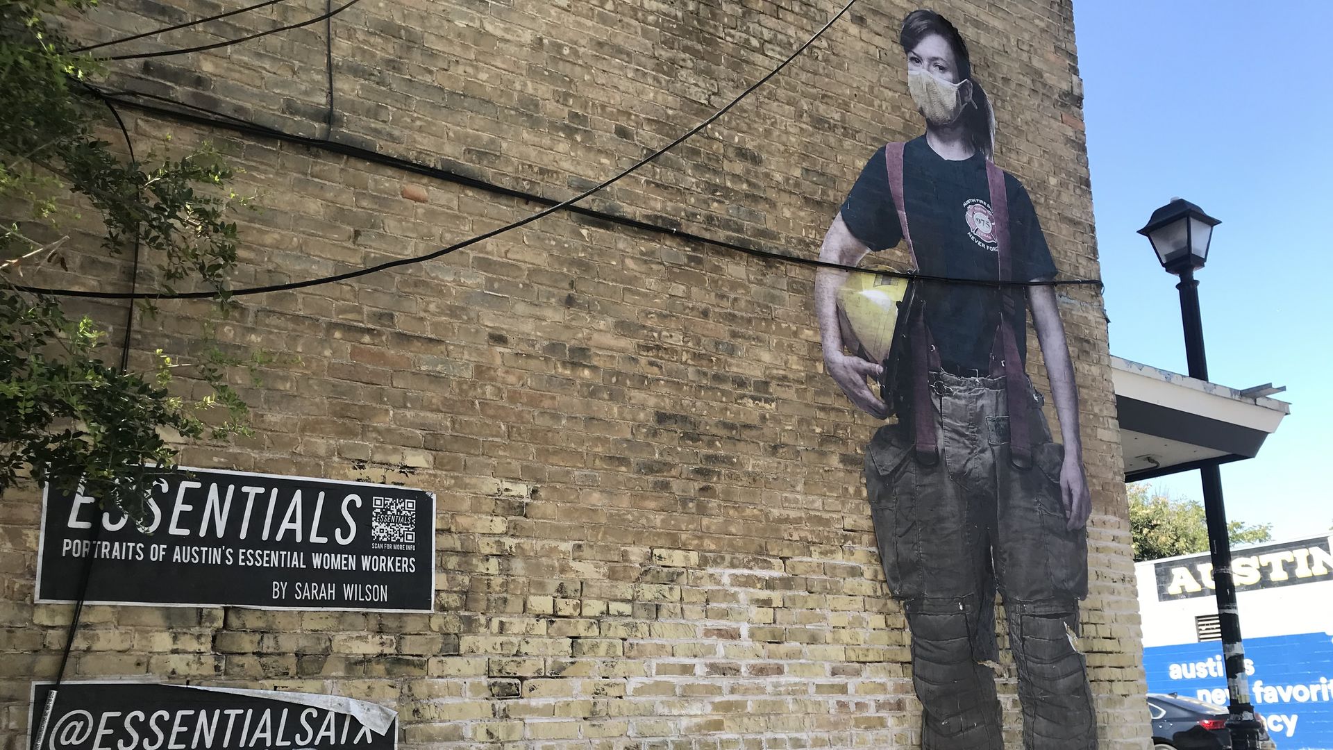 An East Austin mural by Sarah Wilson of an essential woman worker.