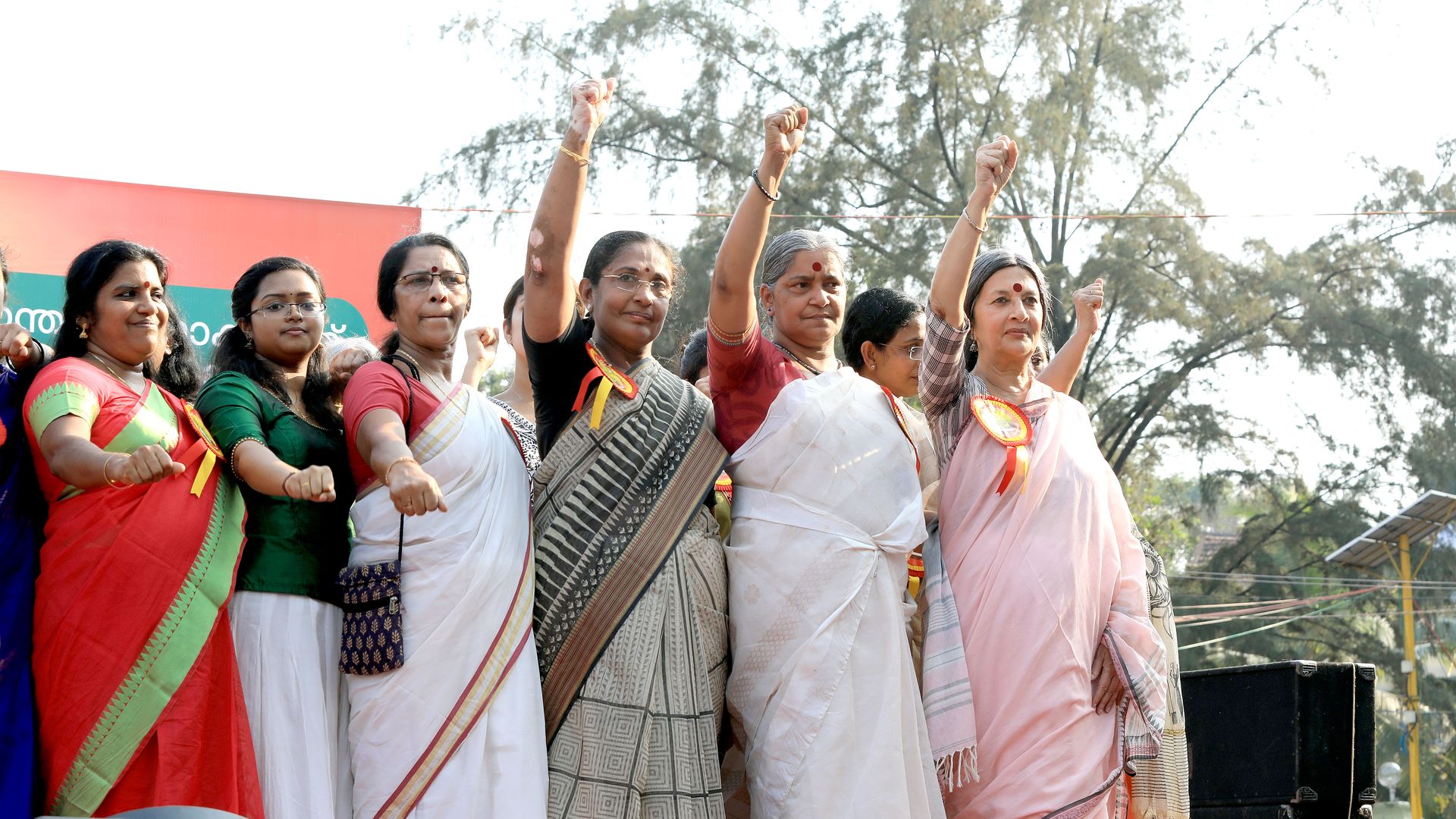 Women take oath as they gather to participate in the 620 km-long 'Women's Wall' against communalism and gender discrimination