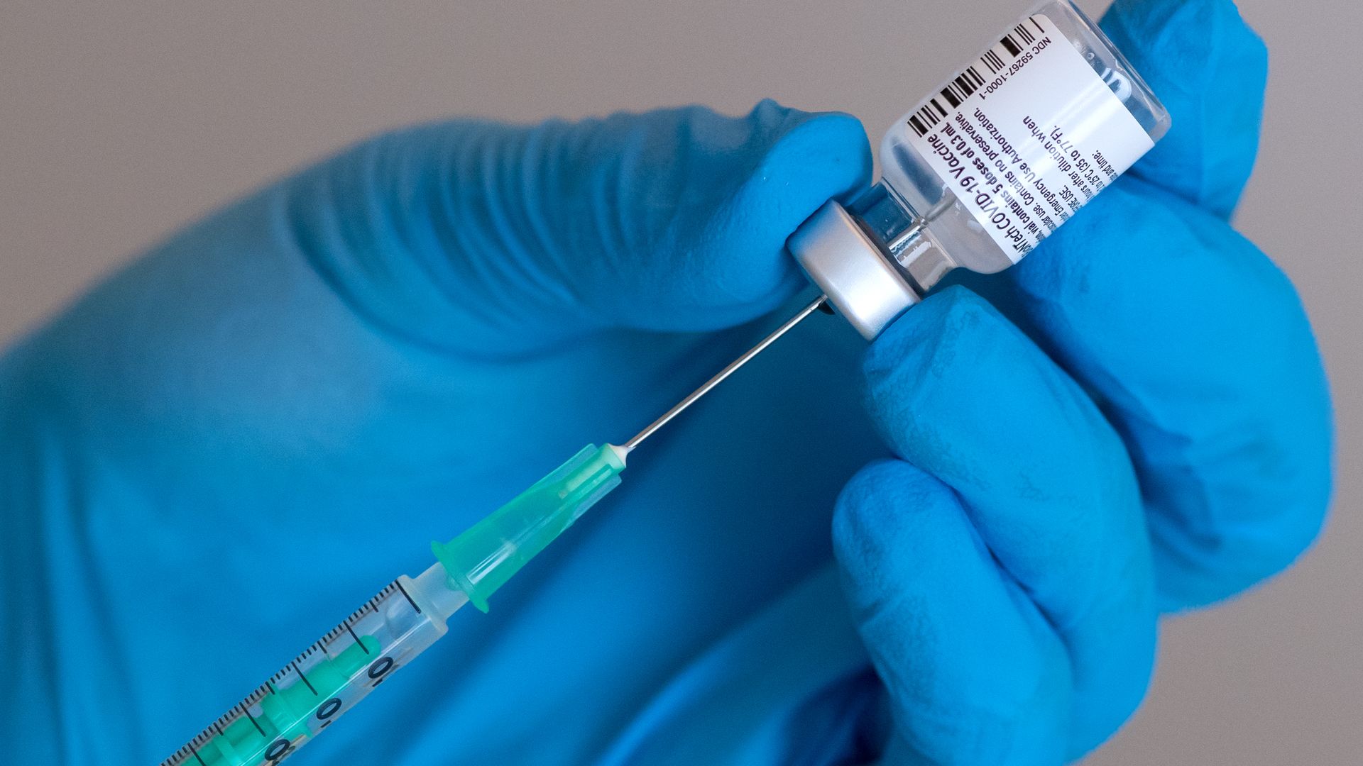 Pizer vaccine vial with a syringe