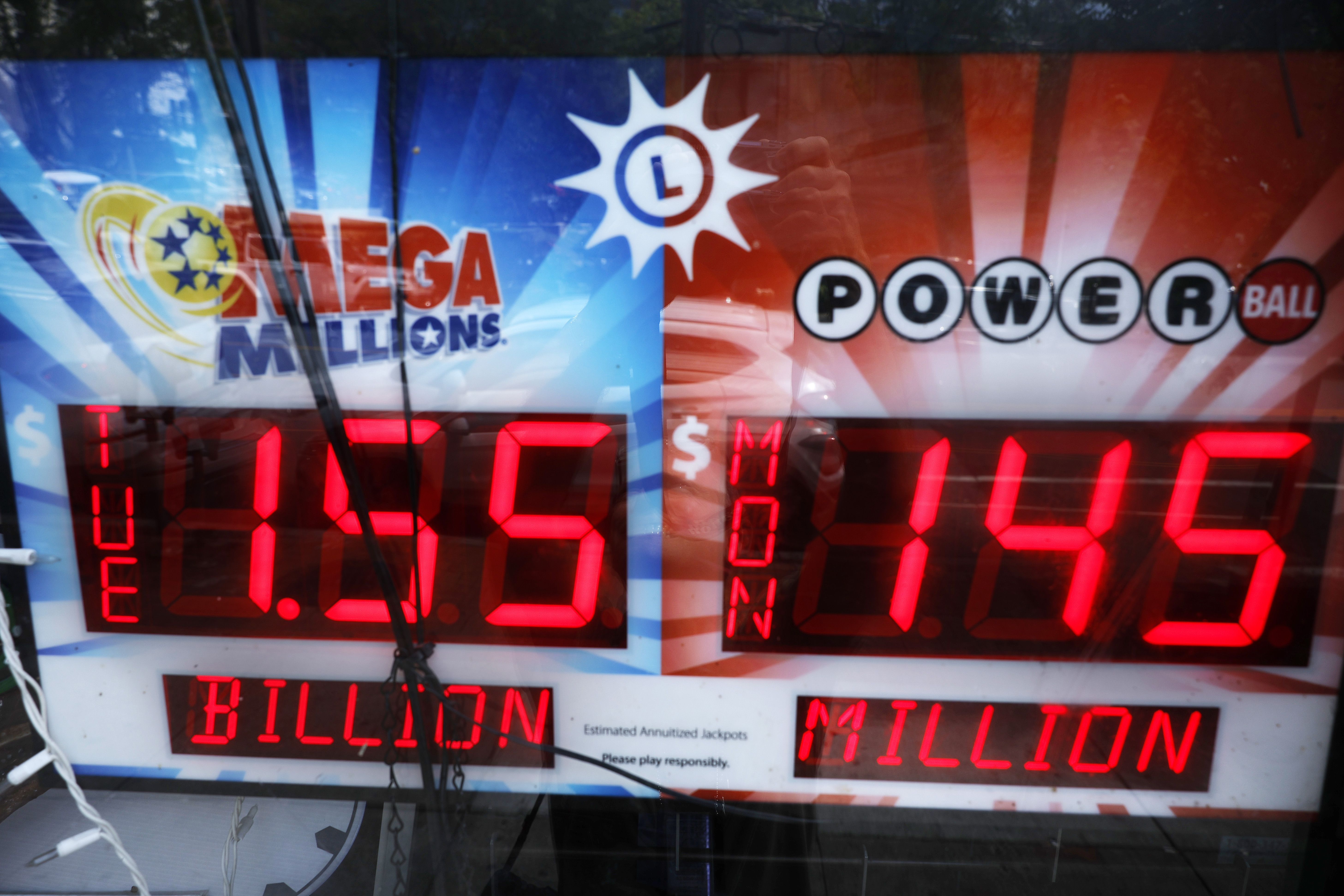 Electronic signs shows Mega Millions and Powerball jackpots 
