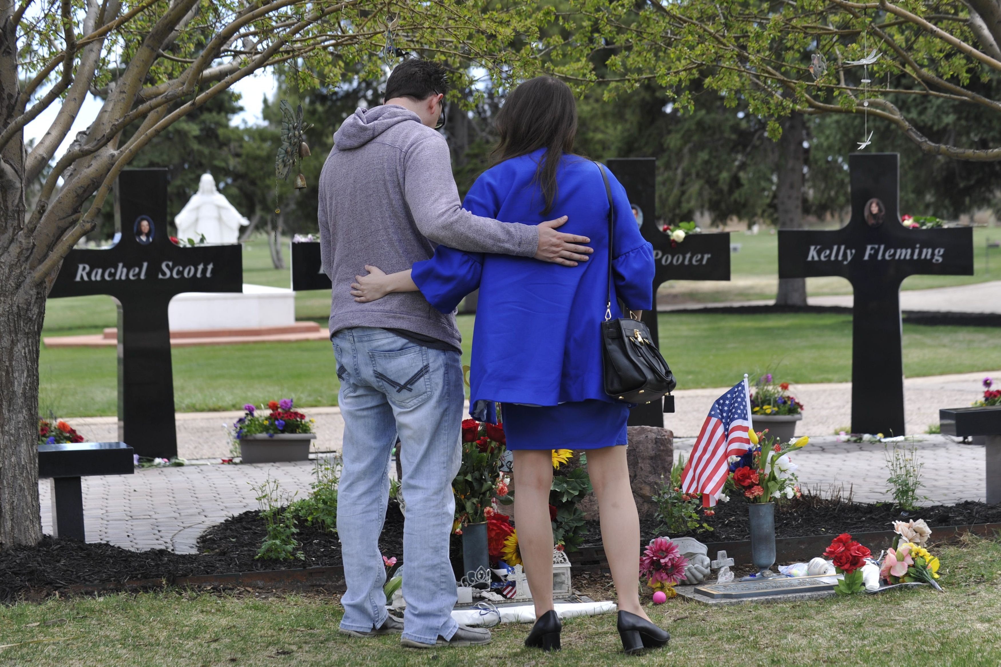  Michael Scott (R) and Marie Sophie (L) visit the grave of his sister, Rachel Scott, at the Chapel Hill Memorial Gardens in Littleton, Colorado.