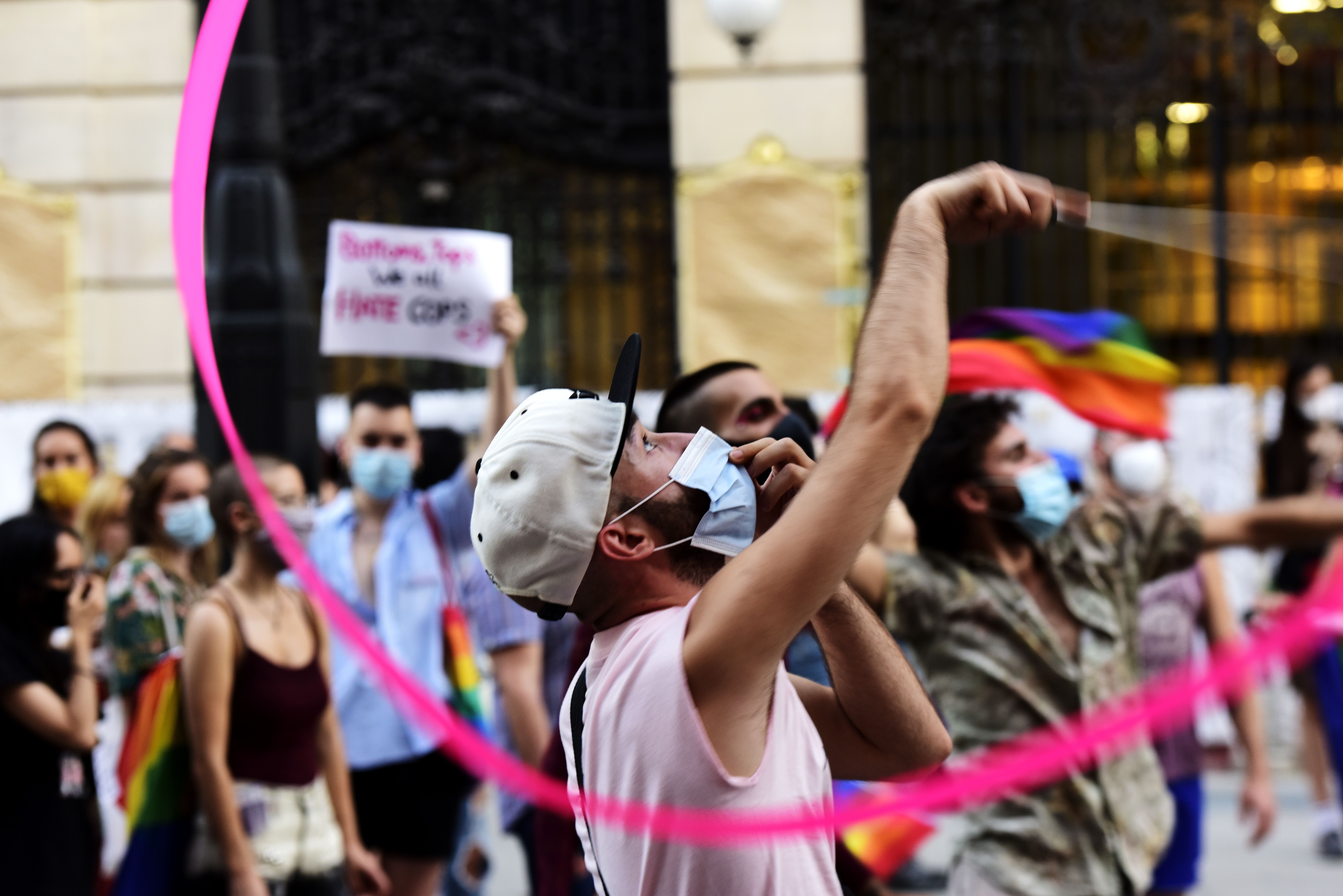 An attendee dances with a ribbon during Alternative Gay Pride on June 28, 2020 in Madrid, Spain