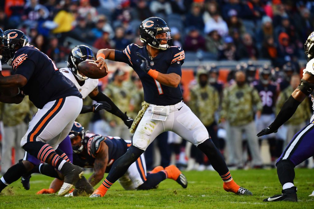 Quarterback Justin Fields #1 of the Chicago Bears passes against the Baltimore Ravens at Soldier Field on November 21, 2021 in Chicago, Illinois. 