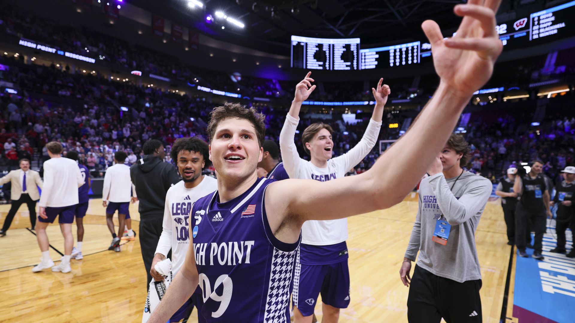 Guard Chase Johnston #99 of the High Point Panthers waves to the crowd after the High Point Panthers upset the Wisconsin Badgers in the first round of the 2026 NCAA Men's Basketball Tournament.