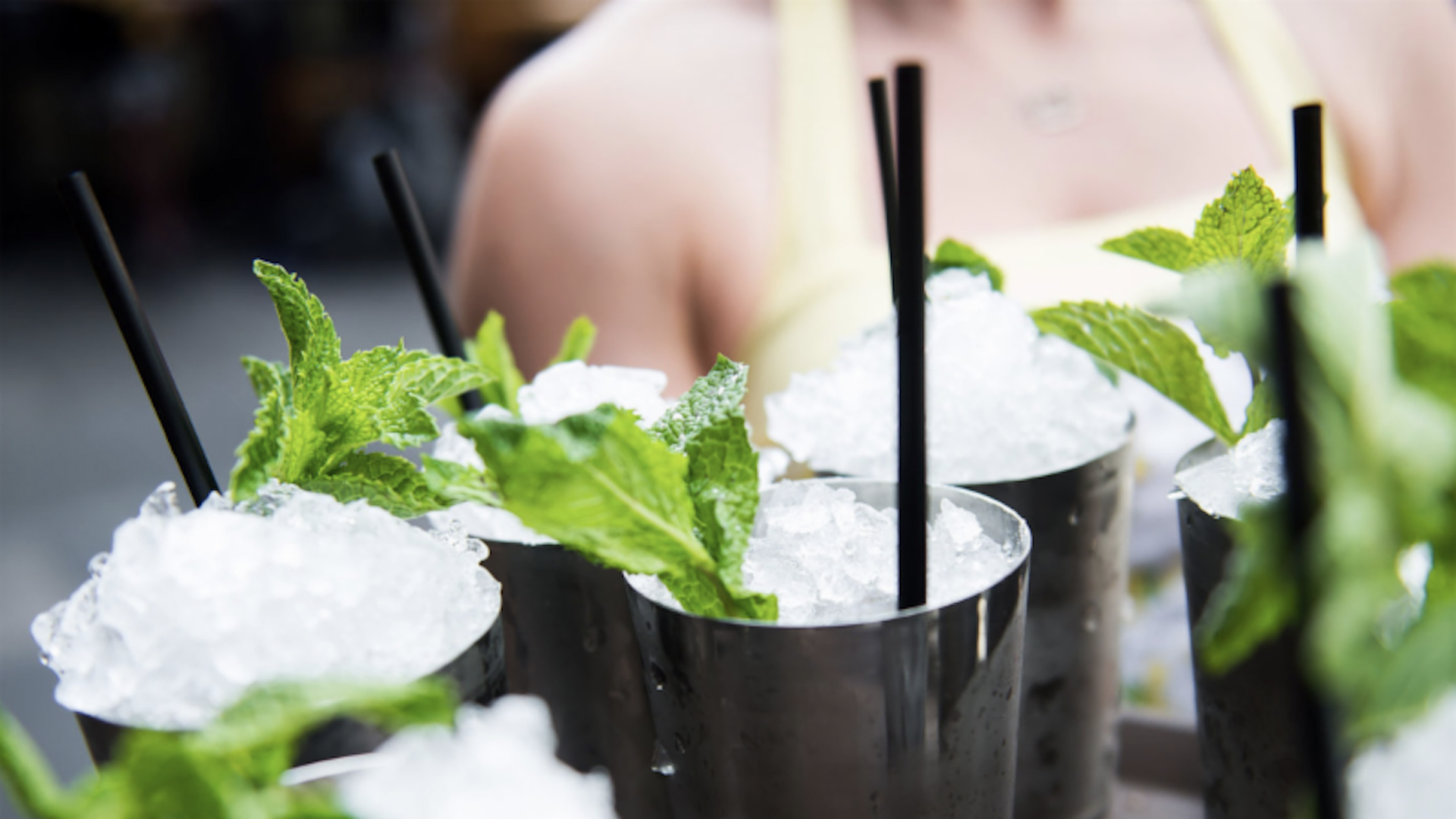 Mint juleps in cups with ice and mint