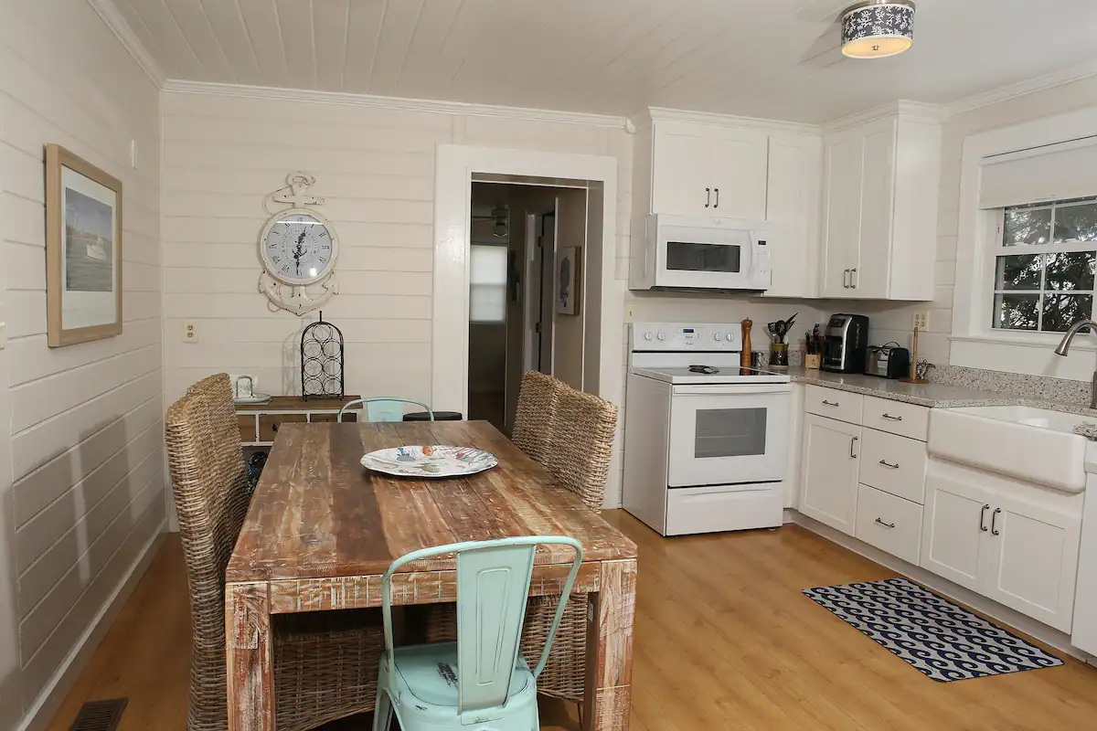 Kitchen and dining area in cottage at Atlantic Beach, North Carolina. 