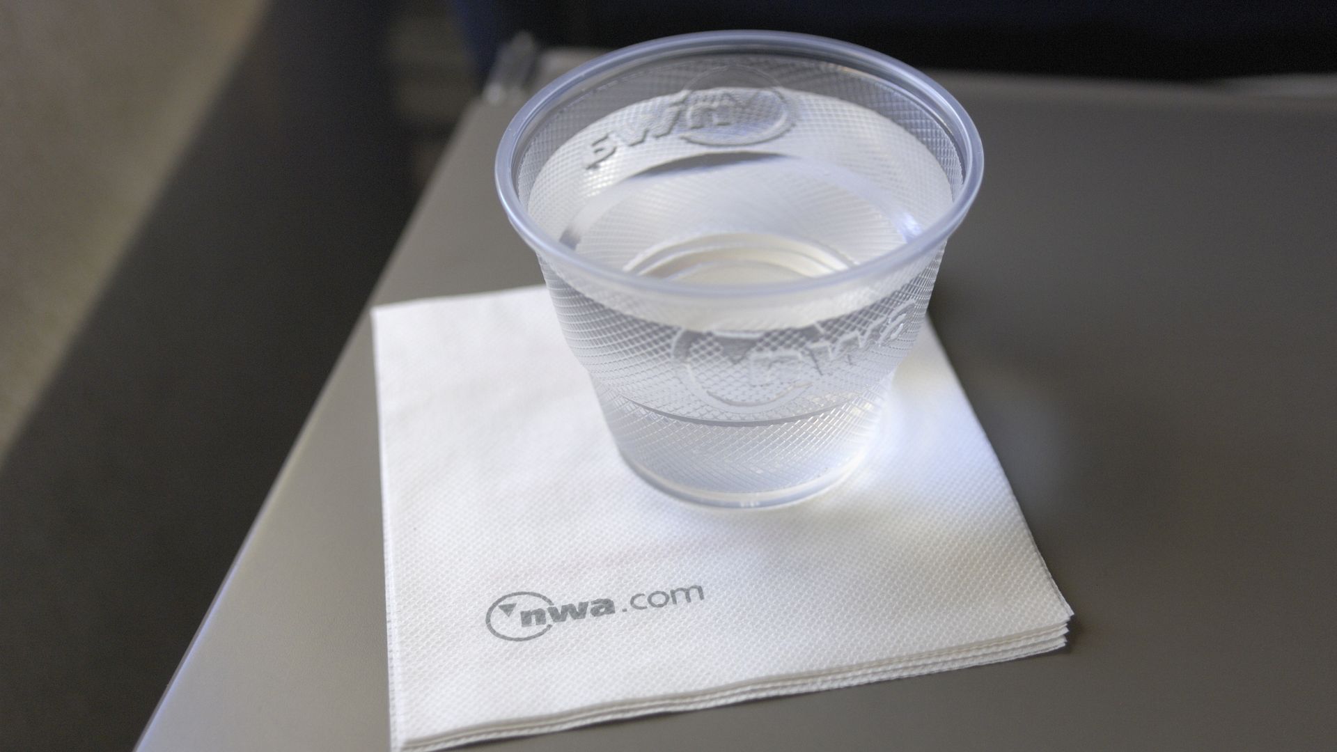A cup of water on an airplane