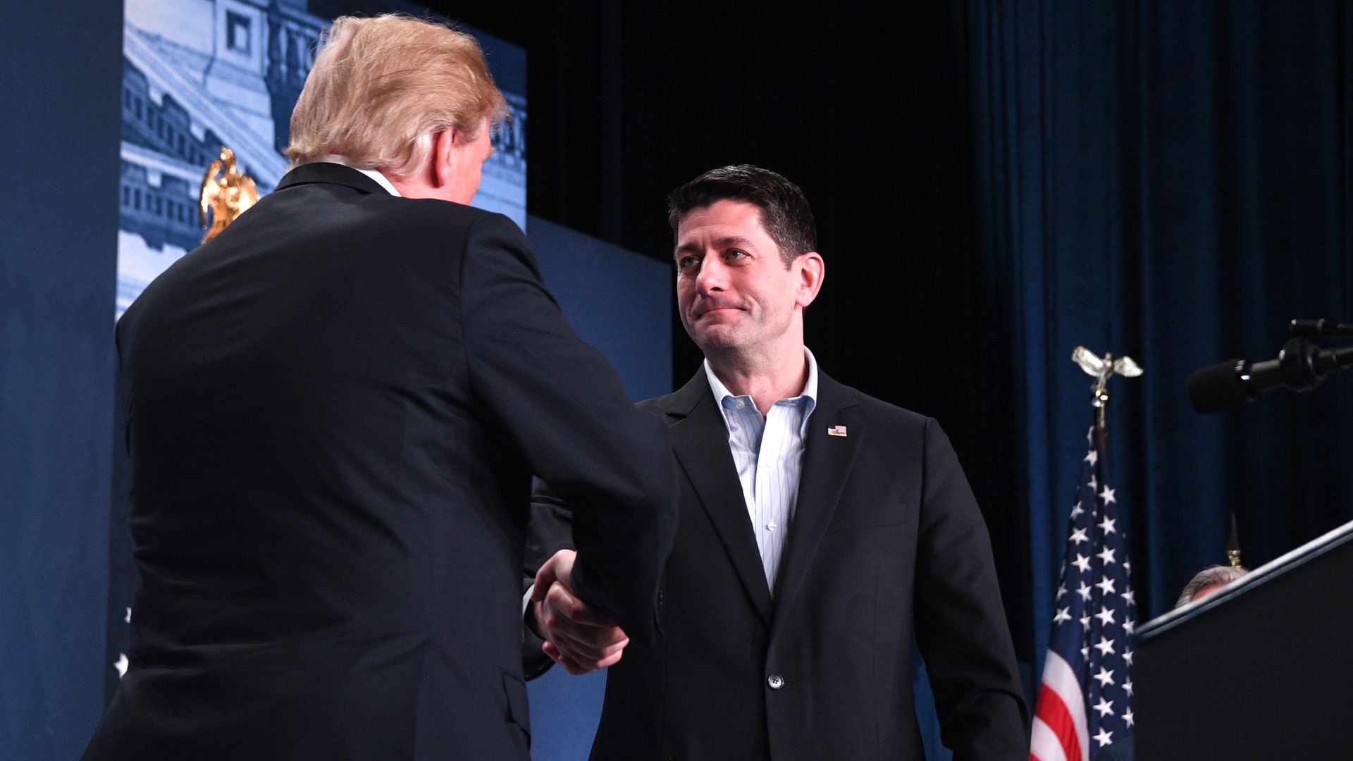 Paul Ryan shaking hands with Donald Trump