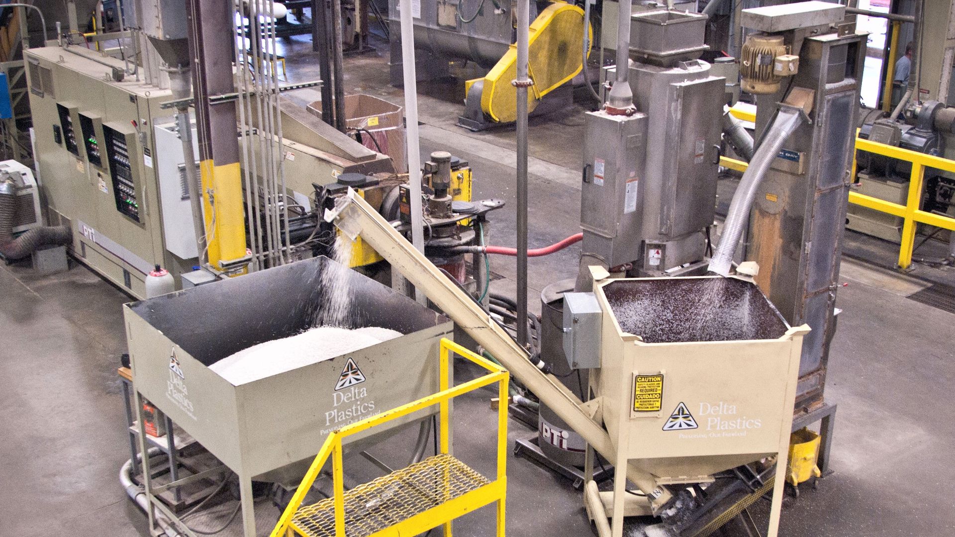 machinery processing pellets of resin