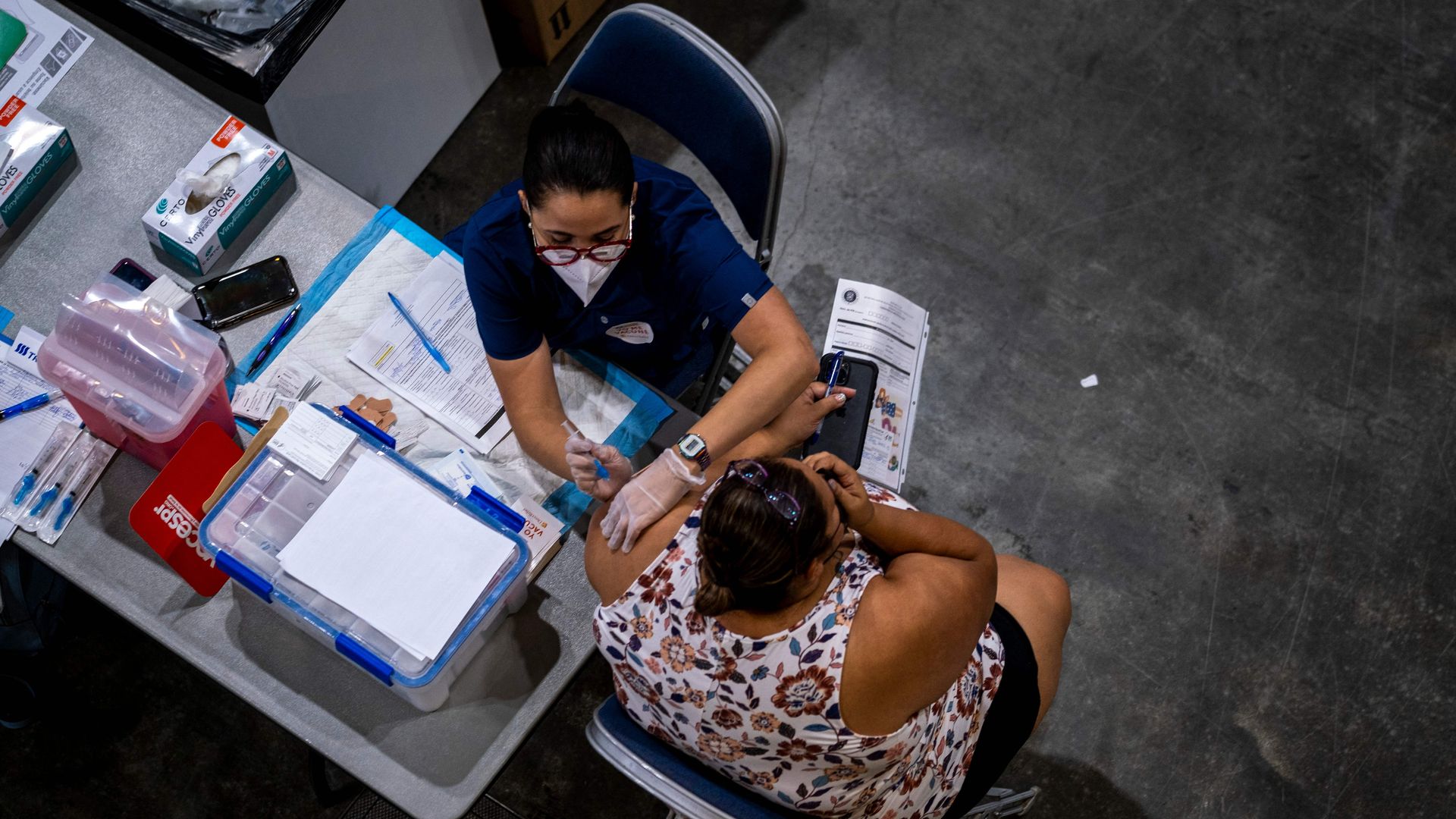 A woman gets vaccinated in San Juan, Puerto Rico